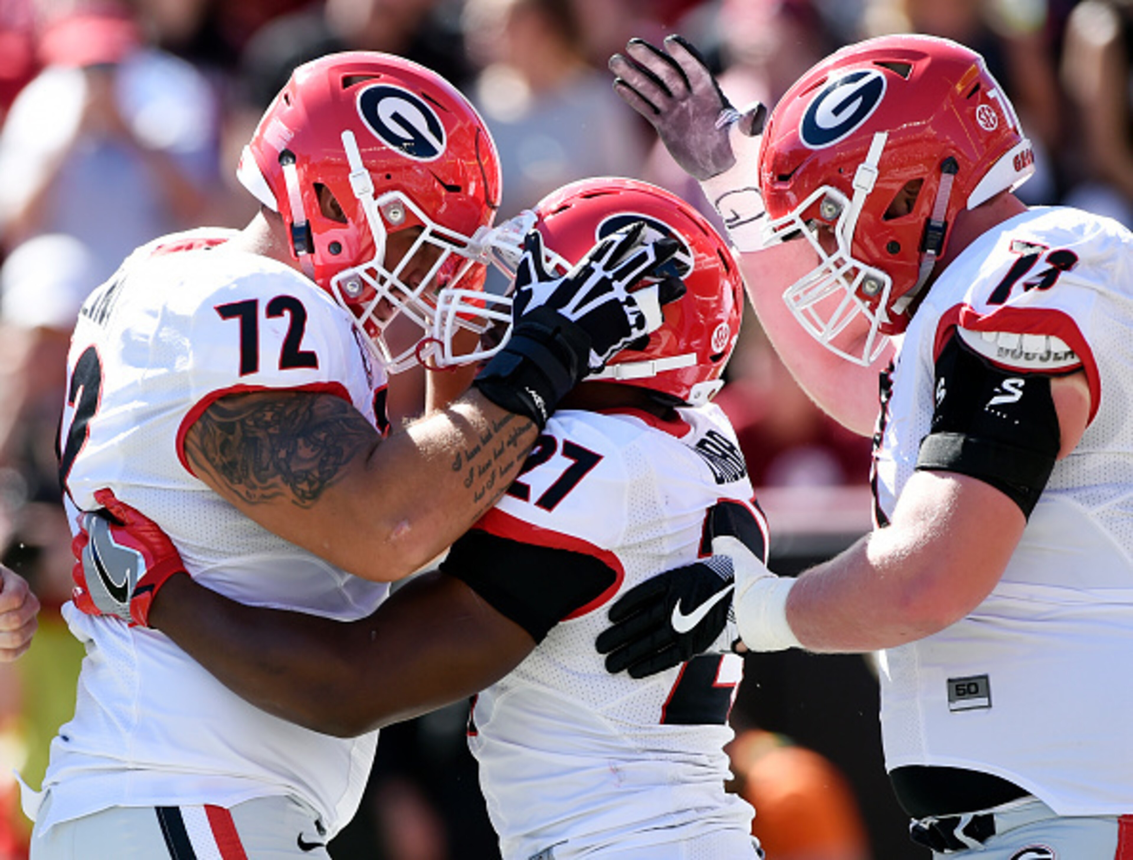 Georgia running back Nick Chubb (center)