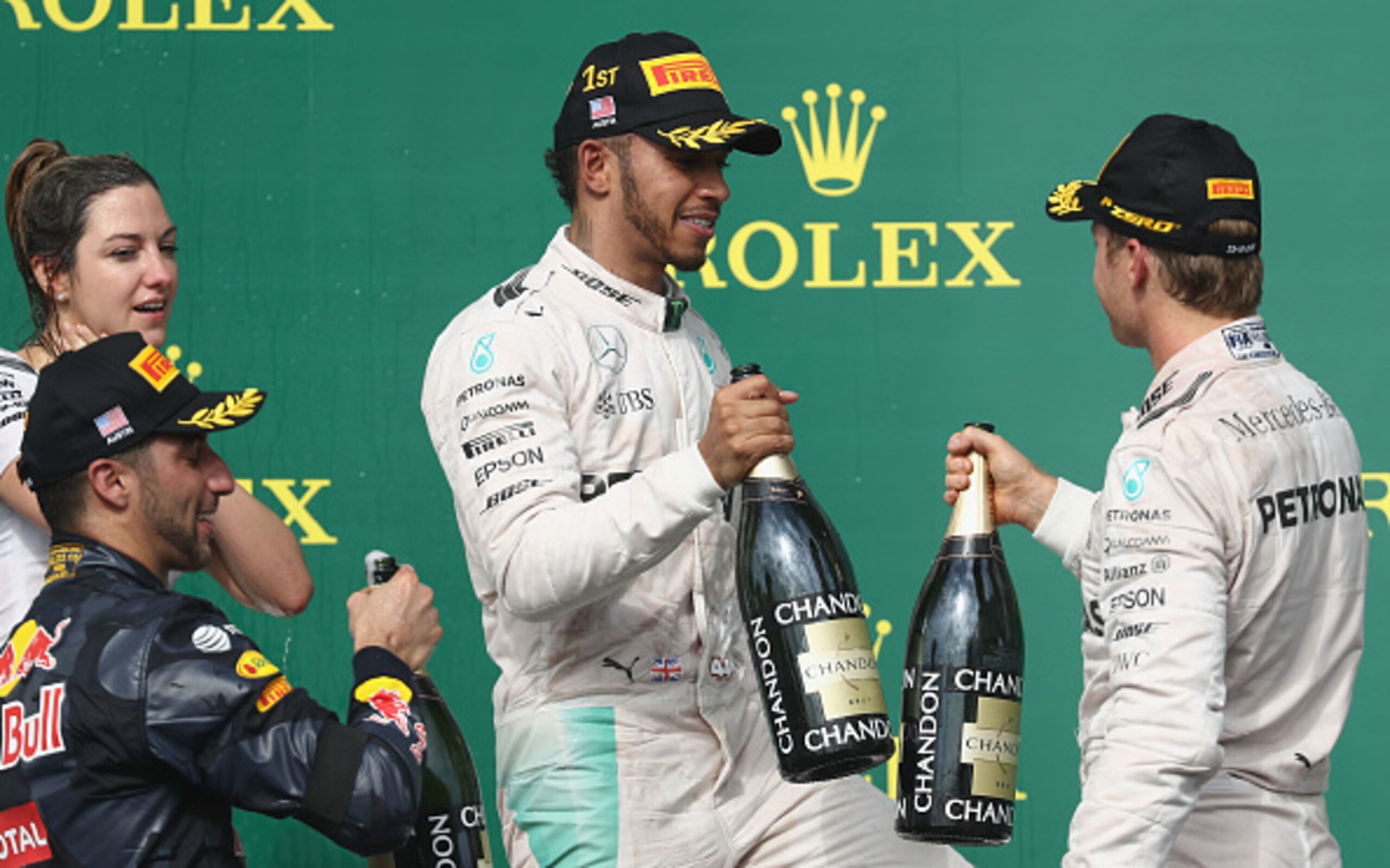 Nico Rosberg (right) congratulates Lewis Hamilton on the U.S. Grand Prix podium.