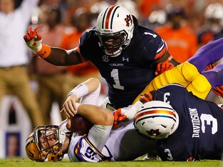 Auburn DT Montravius Adams (top) and end Marlon Davidson (right)