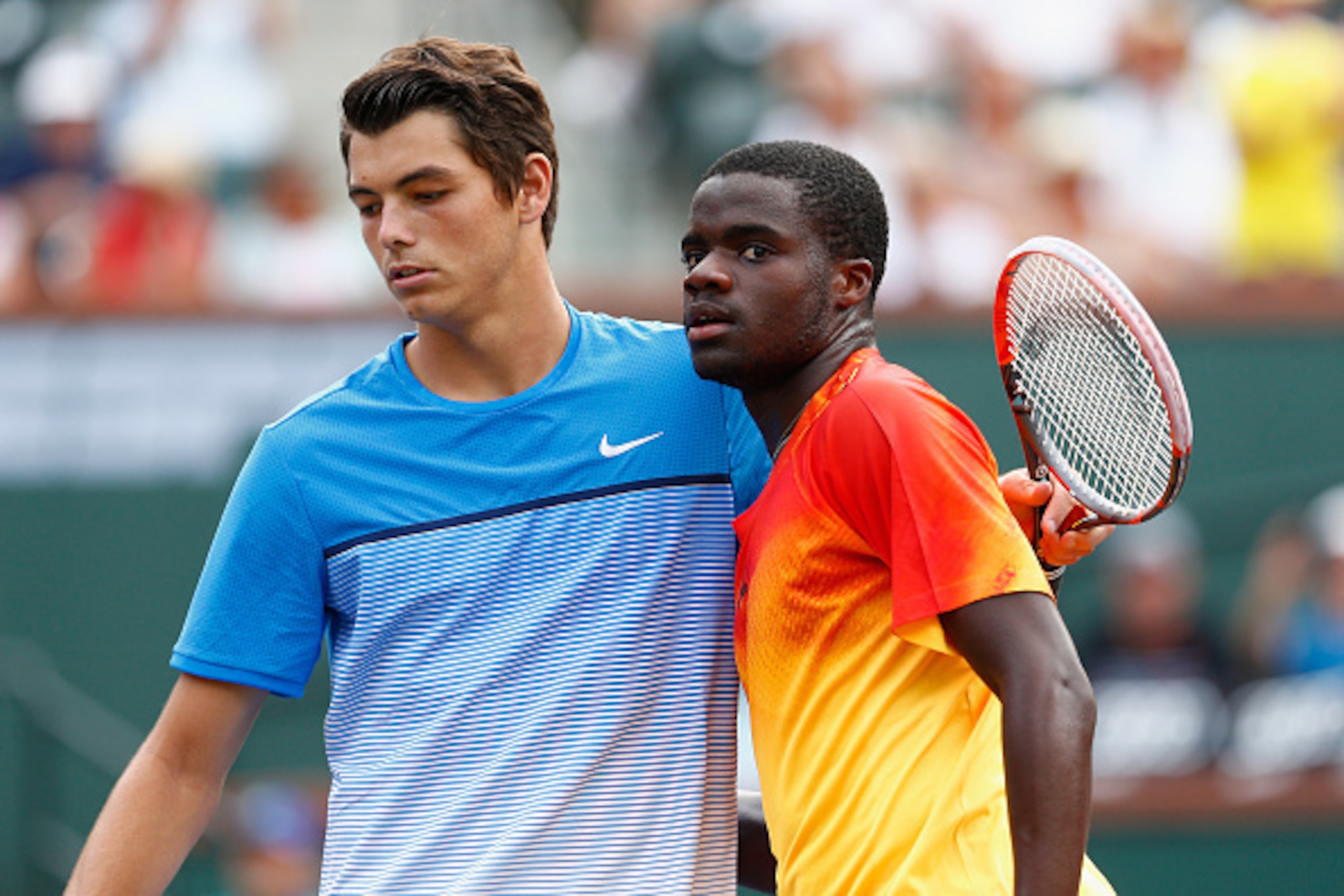 Taylor Fritz, left, and Frances Tiafoe after their match at the 2016 BNP Paribas Open at Indian Wells (CA).