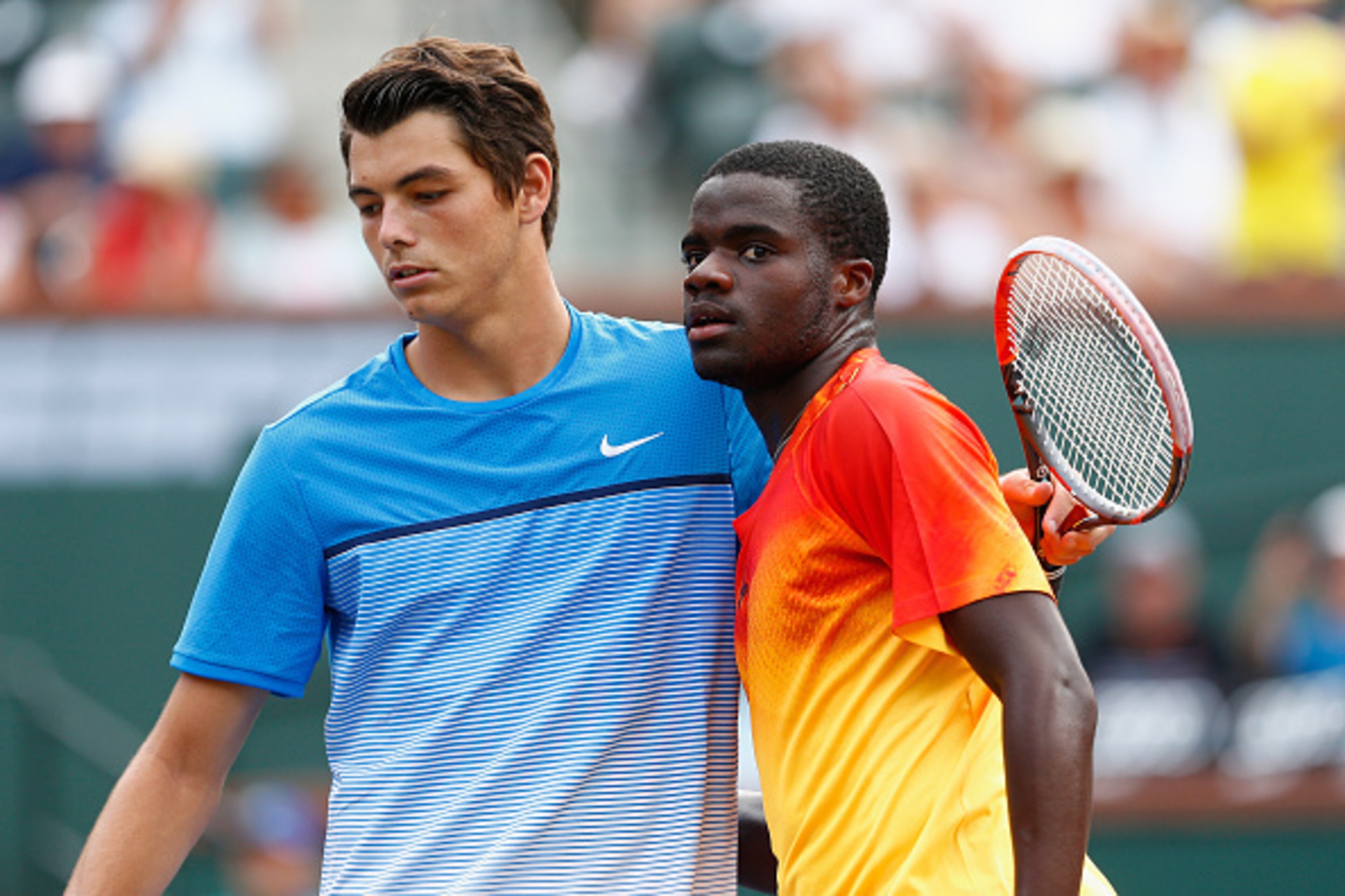 Taylor Fritz, left, and Frances Tiafoe after their match at the 2016 BNP Paribas Open at Indian Wells (CA).