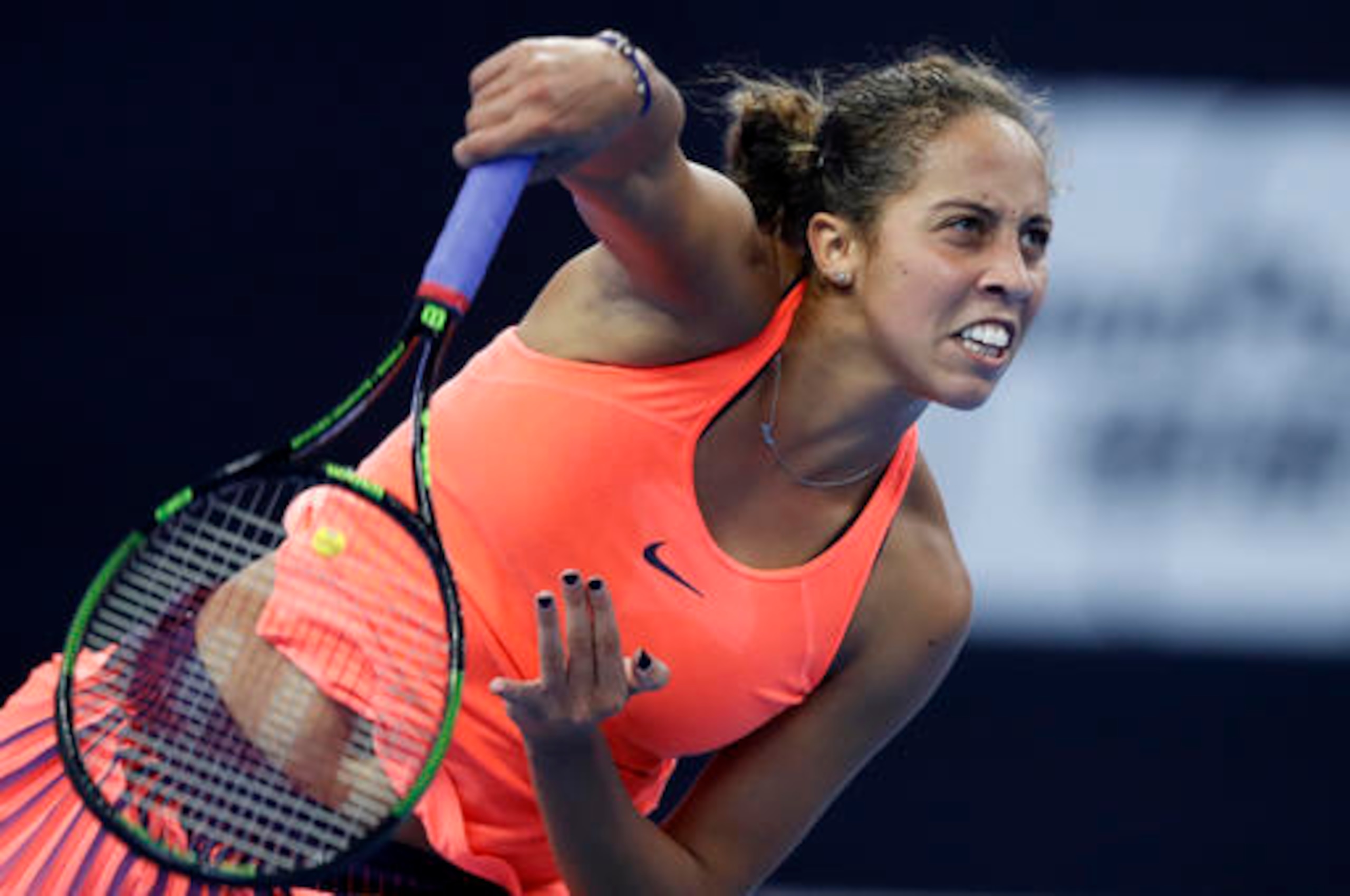 Madison Keys serves during the 2016 WTA Finals in Singapore.