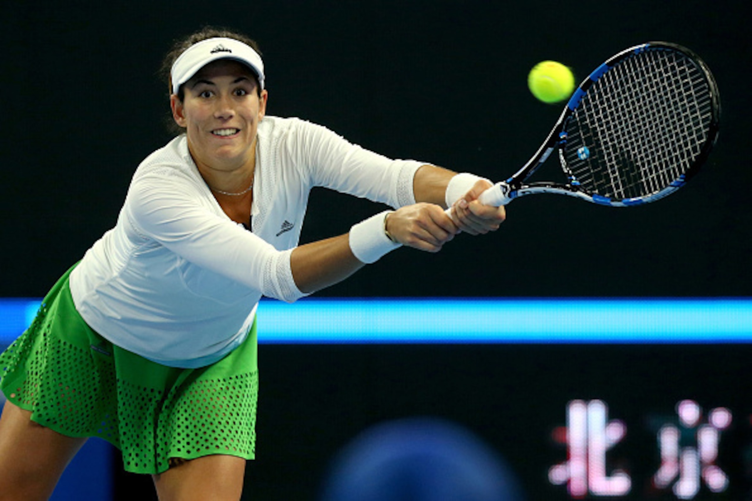 Garbine Muguruza hits a backhand during a match at the 2016 China Open in Beijing.