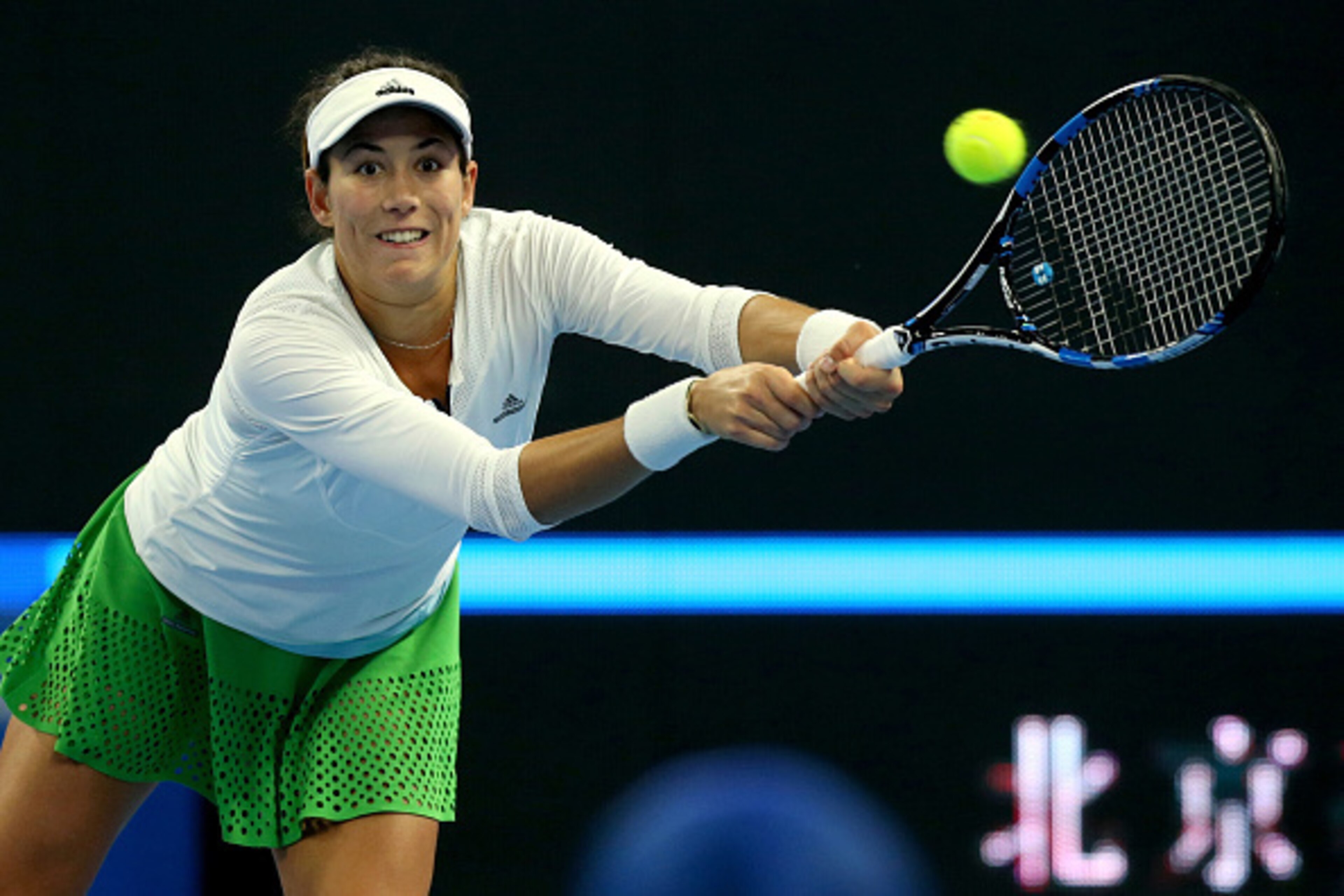 Garbine Muguruza hits a backhand during a match at the 2016 China Open in Beijing.