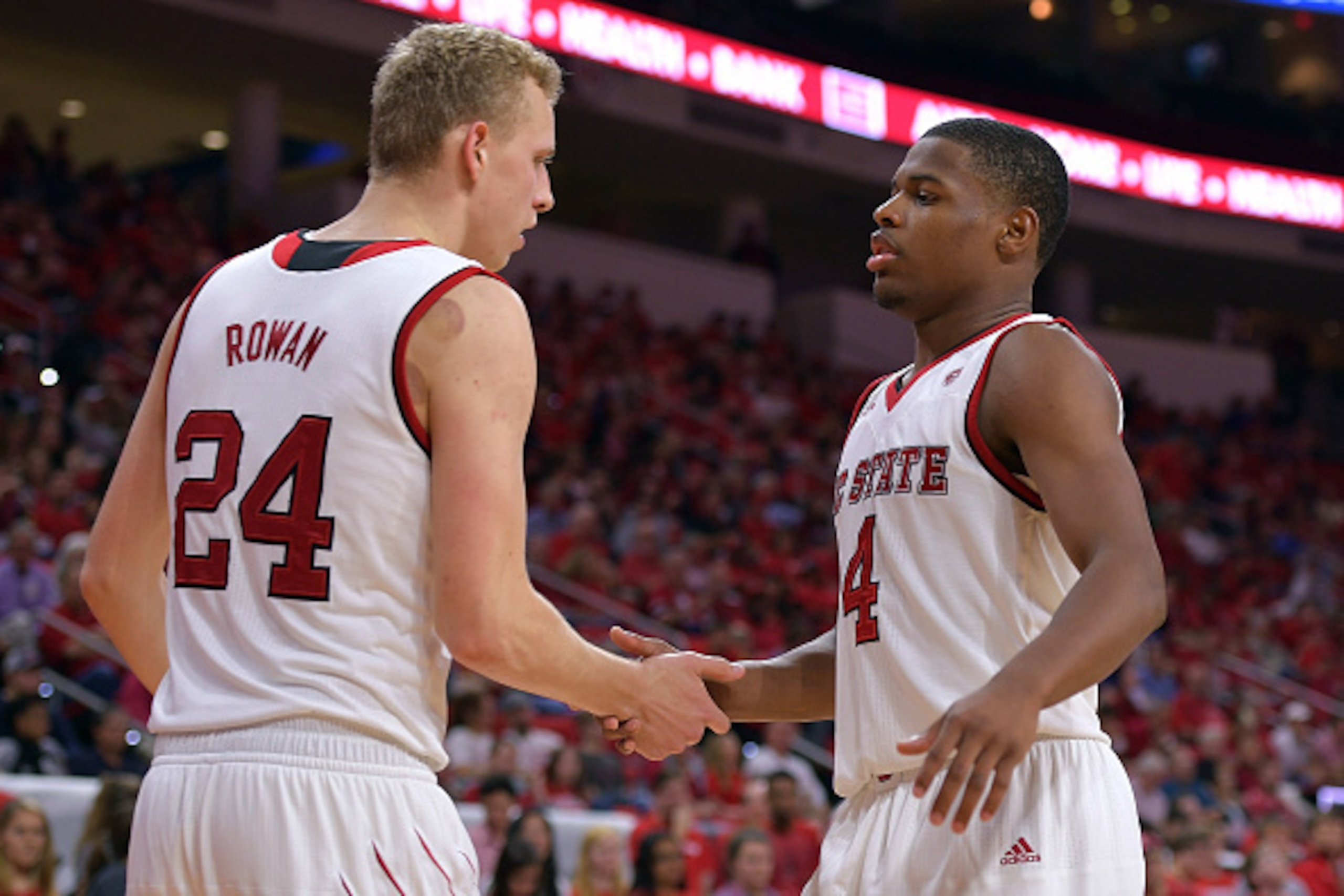 Dennis Smith Jr. (4) and Maverick Rowan (24) are two of the big reasons two of our experts love N.C. State this year.