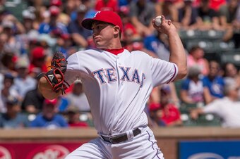 What kind of trade value does Derek Holland have in a thin pitching market?