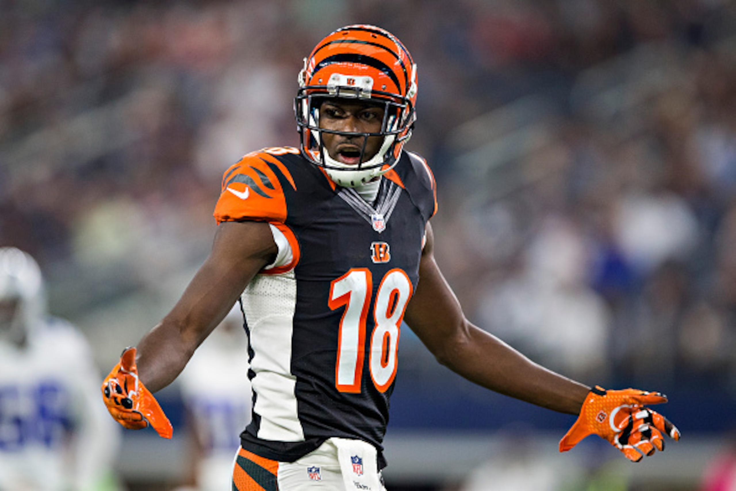 ARLINGTON, TX - OCTOBER 09: A.J. Green #18 of the Cincinnati Bengals looks for a flag to be thrown during a game against the Dallas Cowboys at AT&T Stadium on October 9, 2016 in Arlington, Texas. The Cowboys defeated the Bengals 28-14.  (Photo by Wesley H