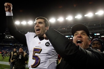 FOXBORO, MA - JANUARY 20:  Head coach John Harbaugh and Joe Flacco #5 of the Baltimore Ravens celebrate after defeating the New England Patriots in the 2013 AFC Championship game at Gillette Stadium on January 20, 2013 in Foxboro, Massachusetts. The Balti