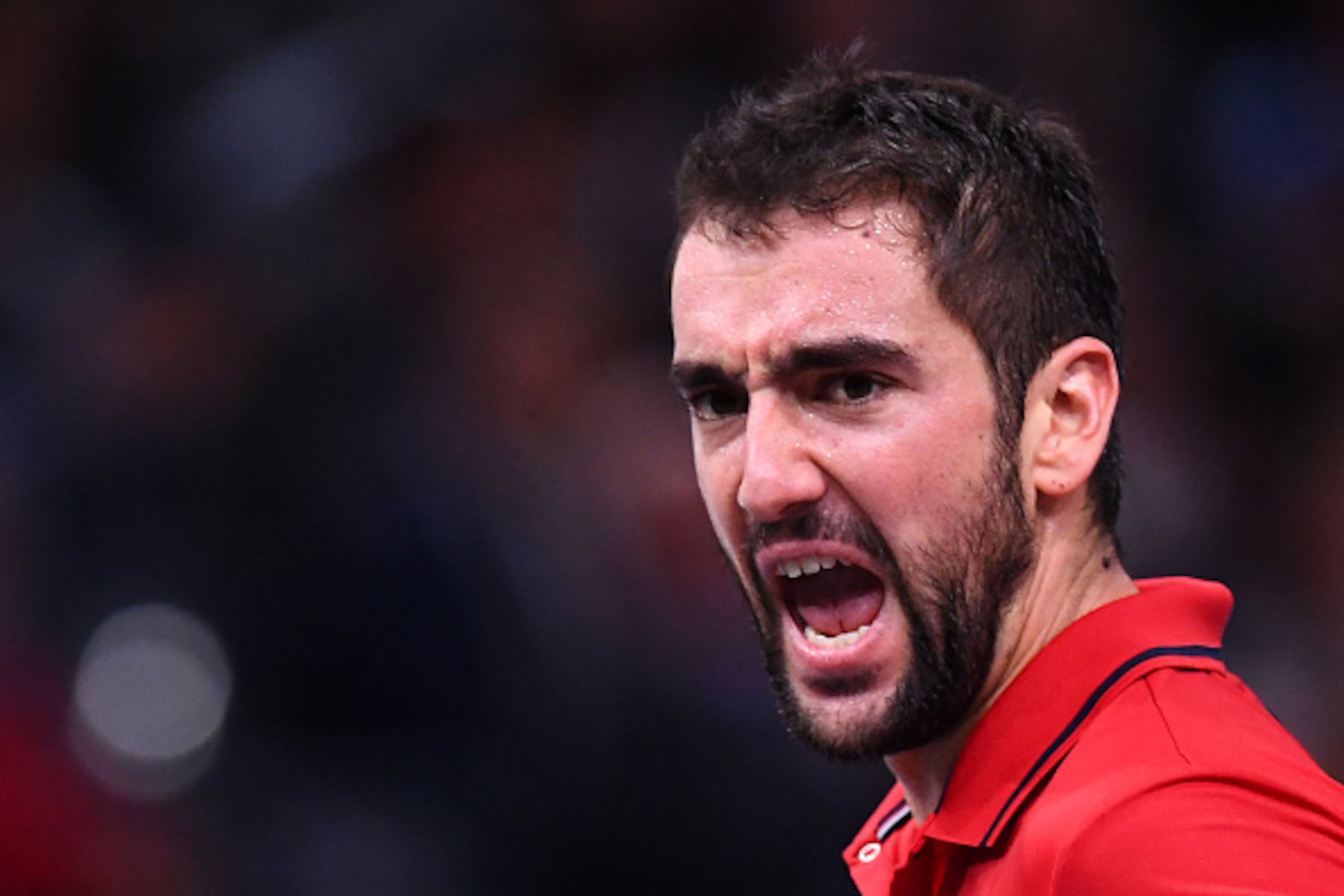 Marin Cilic yells during a match at the 2016 Paris Masters.