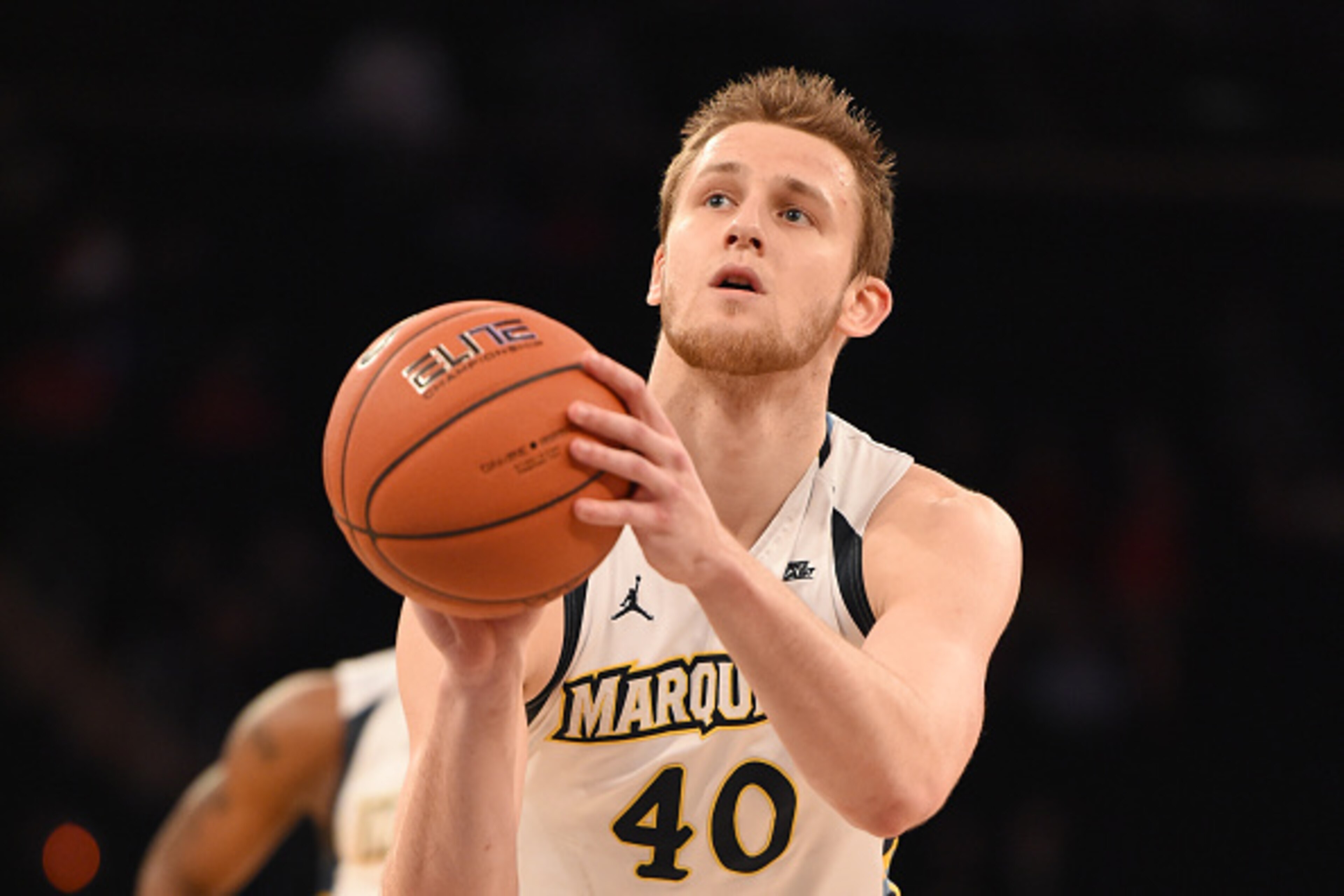 NEW YORK, NY - MARCH 09: Luke Fischer #40 of the Marquette Golden Eagles takes a foul shot during the first round game of the Big East College Basketball Tournament against the St. John's Red Storm at the Madison Square Garden on March 9, 2016 in New York