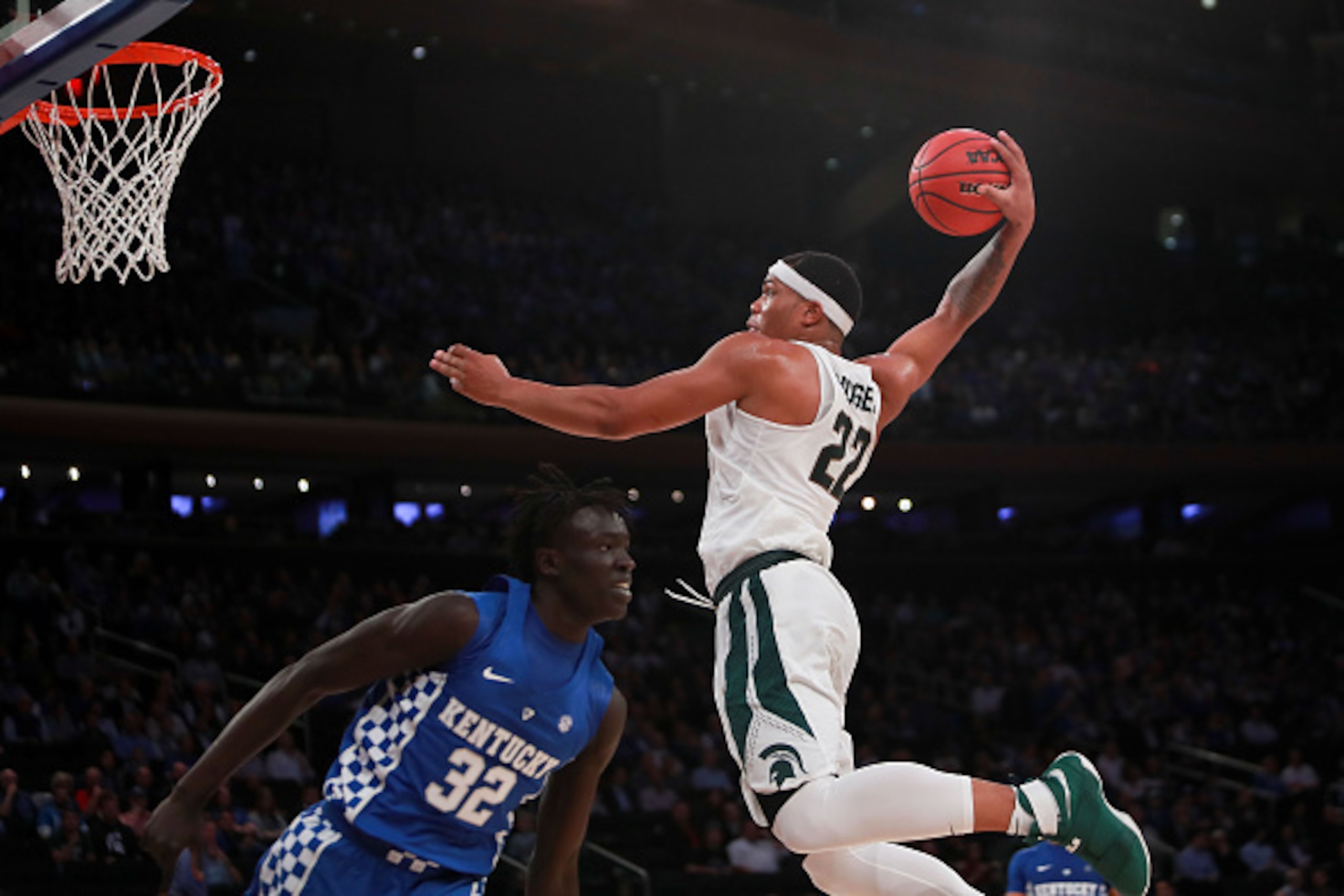 Miles Bridges rises up for a dunk.