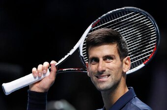 Novak Djokovic smiles after defeating David Goffin at the 2016 ATP World Tour Finals.