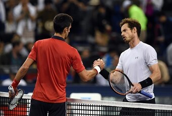 Novak Djokovic and Andy Murray shake hands after a match at the 2015 Shanghai Masters.
