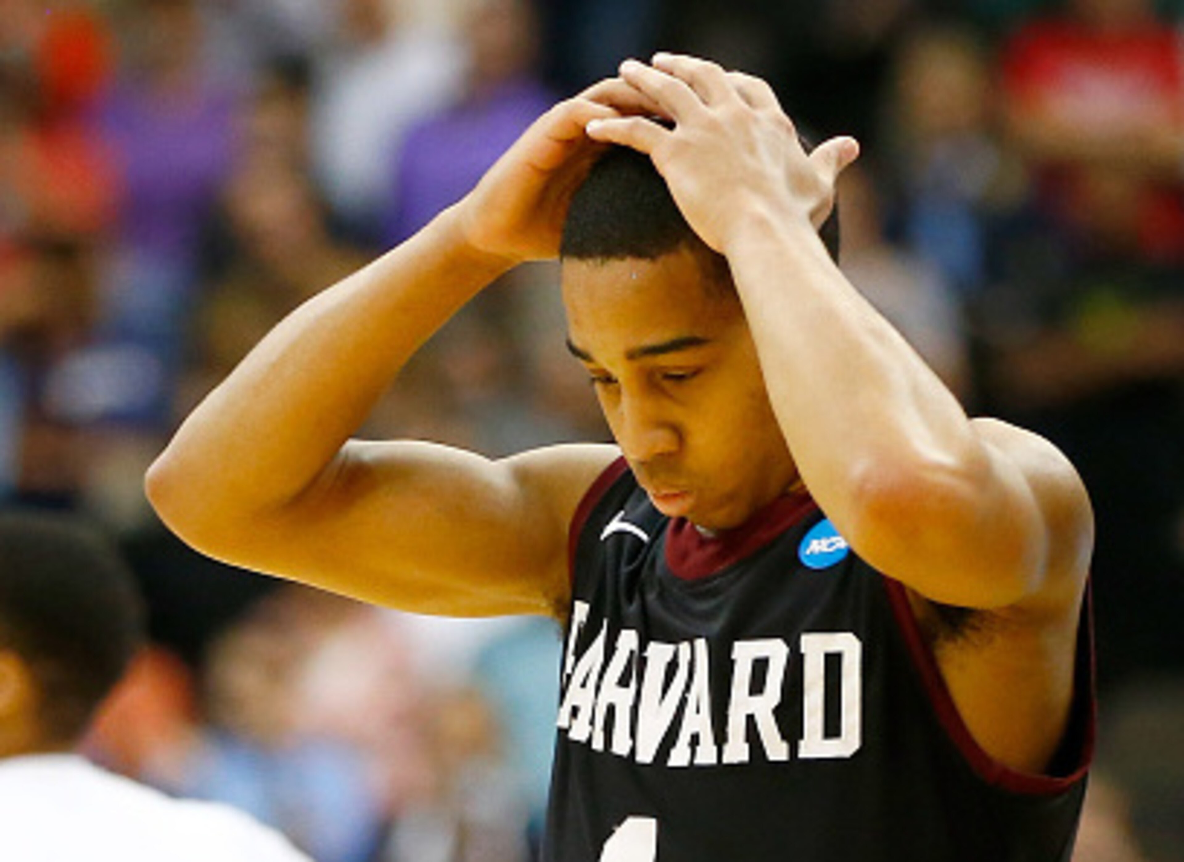 How did Harvard lose to Holy Cross?