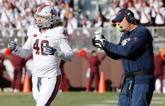 Bronco Mendenhall had struggles in his first season at VIrginia.