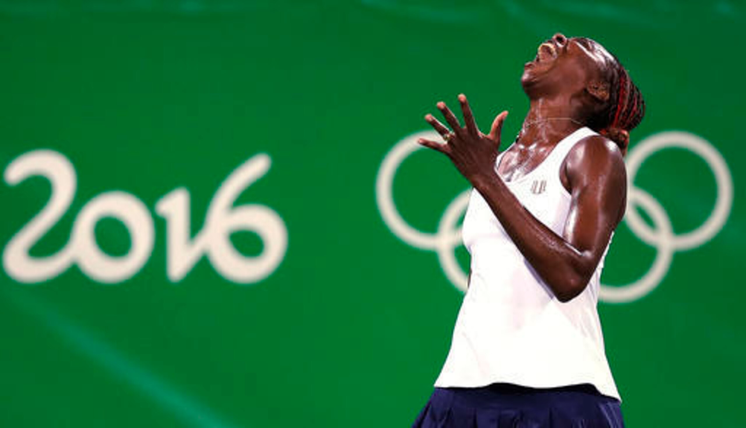 Venus Williams reacts to a missed opportunity during a match at the 2016 Summer Olympics in Rio.