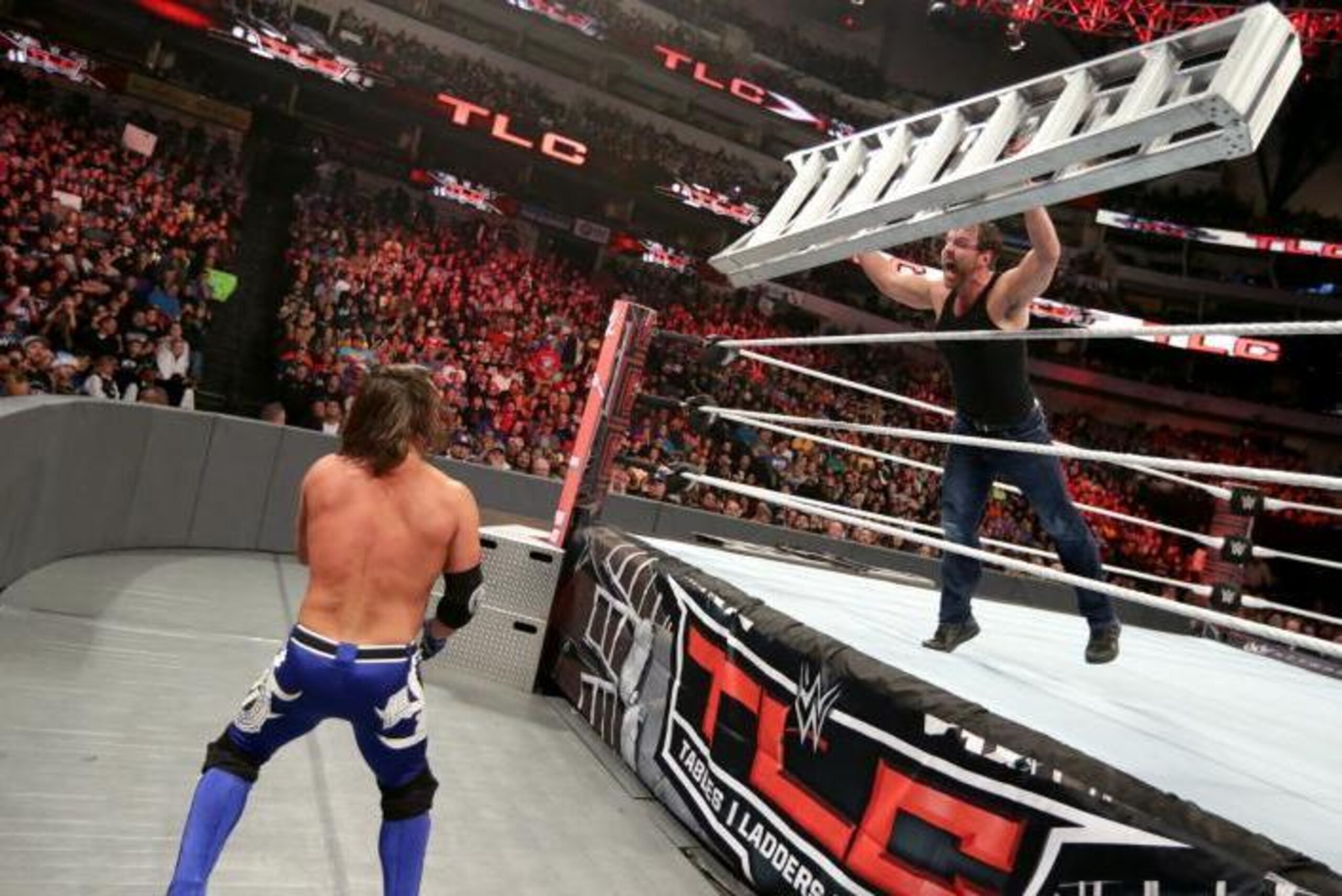AJ Styles and Dean Ambrose engaged in a brutal battle at TLC. AJ Styles and Dean Ambrose engaged in a brutal battle at TLC.