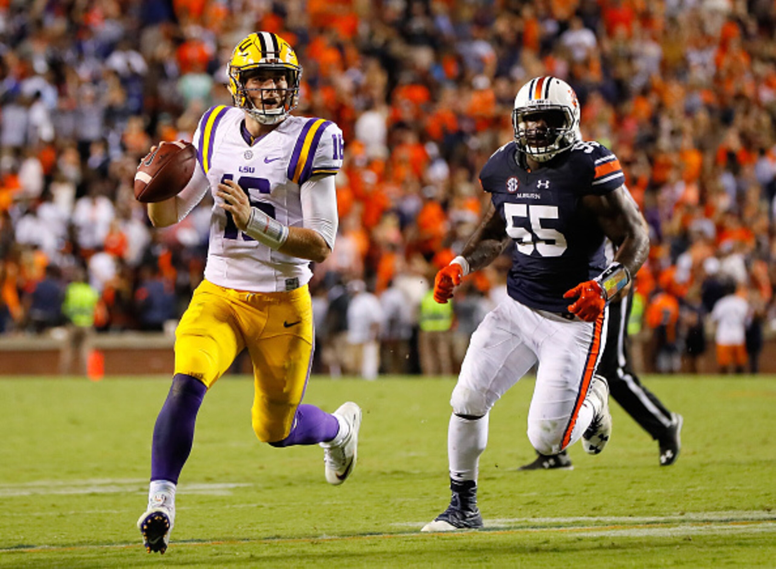 AUBURN, AL - SEPTEMBER 24:  Danny Etling #16 of the LSU Tigers looks to pass for a touchdown to end the game against Carl Lawson #55 of the Auburn Tigers at Jordan-Hare Stadium on September 24, 2016 in Auburn, Alabama.  The officials reviewed the touchdow