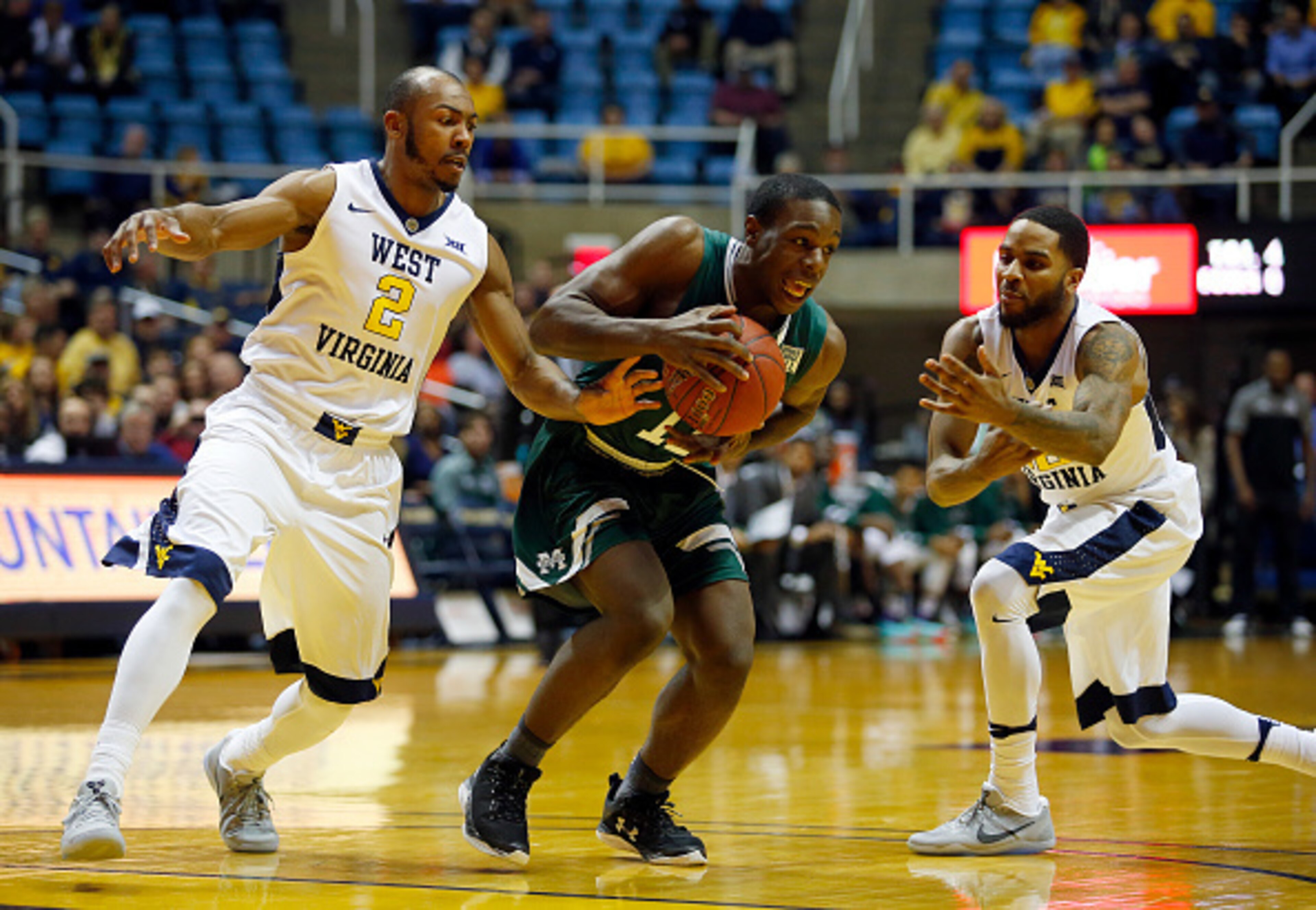 There's a good chance this play resulted in a turnover, since West Virginia forced 40 of them against Manhattan.