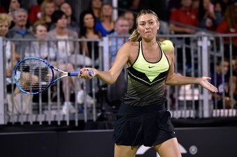 Maria Sharapova hits a forehand during an exhibition match in Las Vegas.