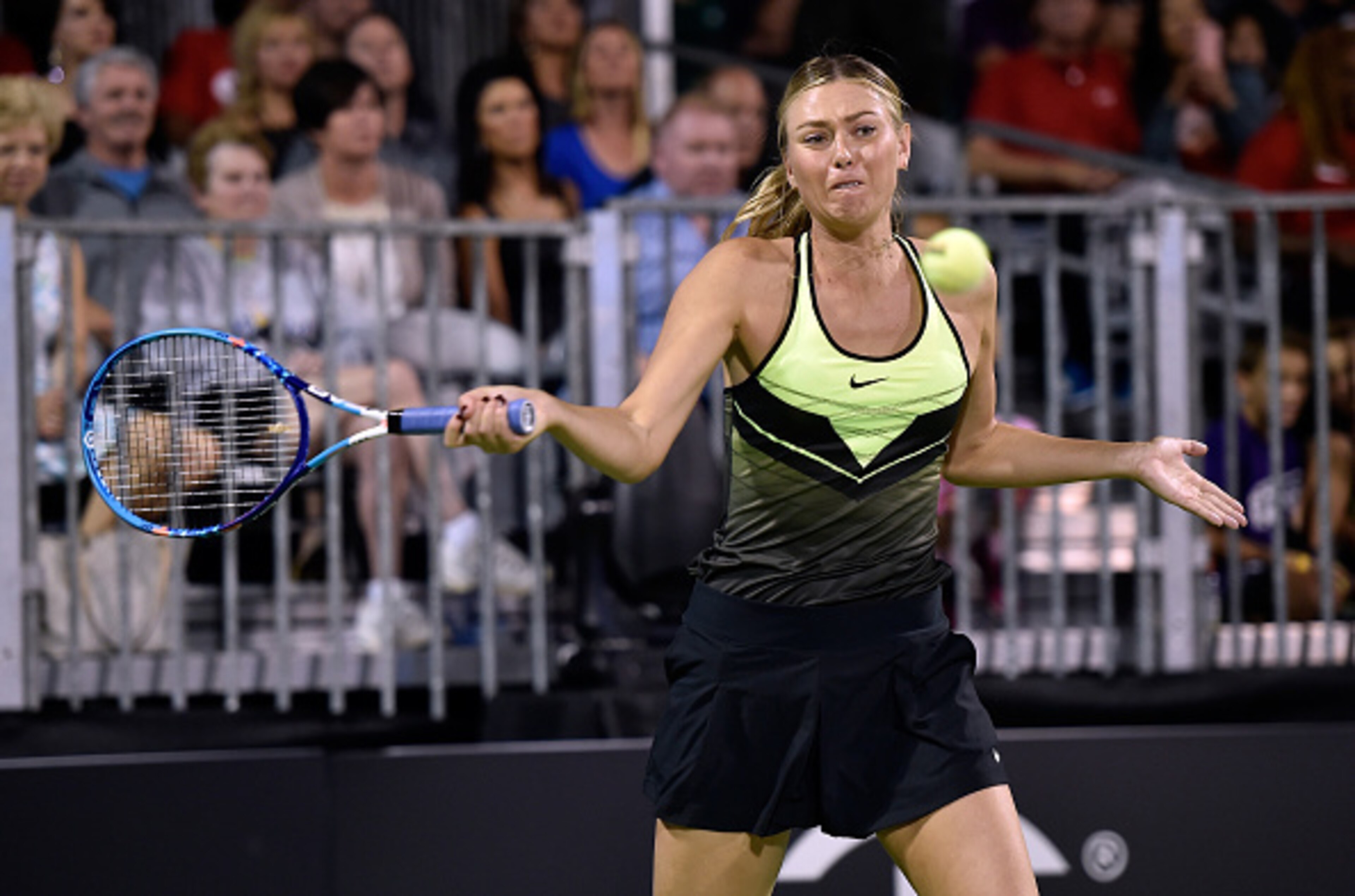 Maria Sharapova hits a forehand during an exhibition match in Las Vegas.