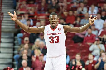 FAYETTEVILLE, AR - DECEMBER 6:  Moses Kingsley #33 of the Arkansas Razorbacks tries to get the crowd going during a game against the Houston Cougars at Bud Walton Arena on December 6, 2016 in Fayetteville, Arkansas.  The Razorbacks defeated the Cougars 84