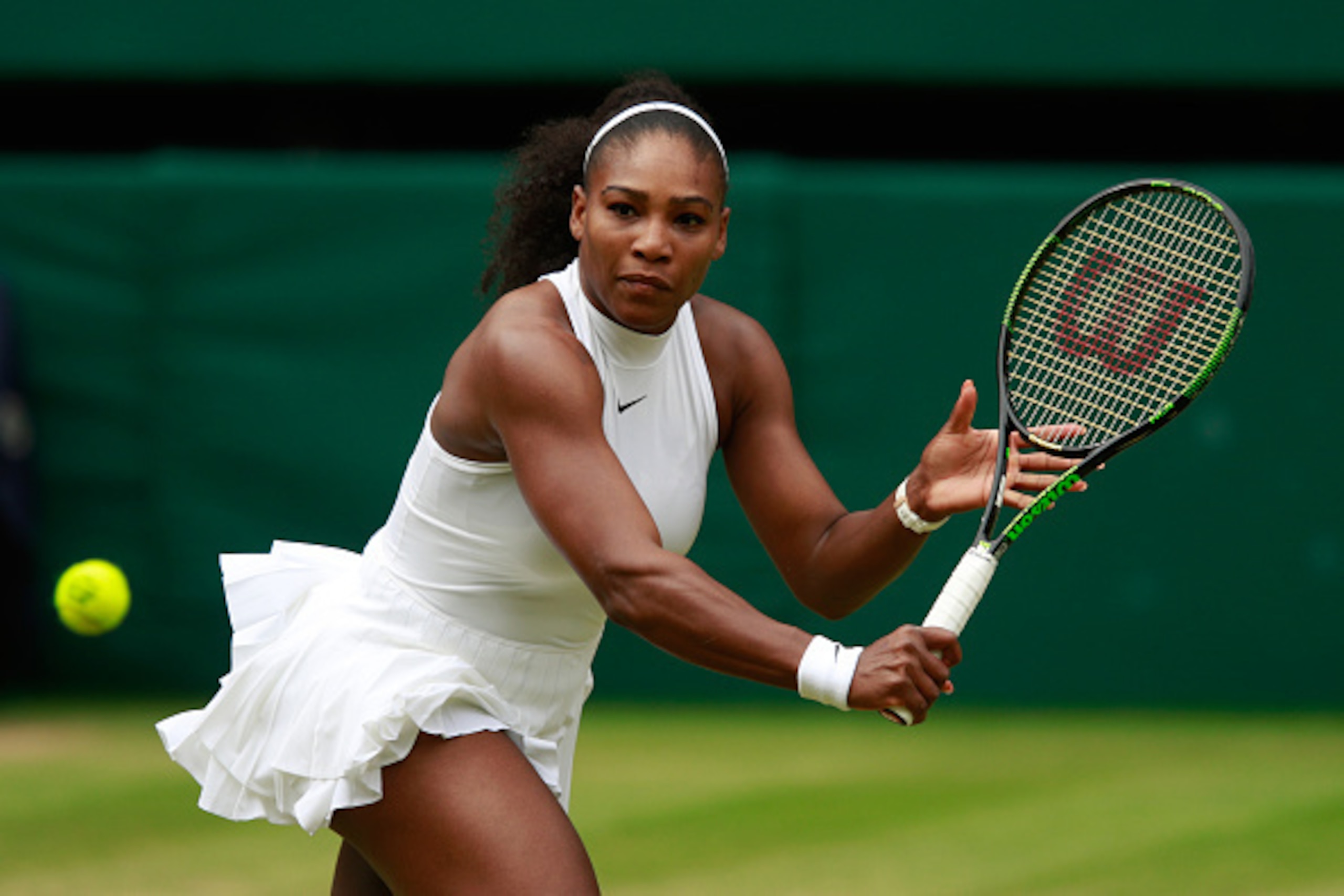 Serena Williams hits a backhand slice during the 2016 Wimbledon finals.