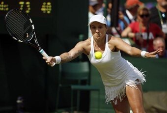 Bethanie Mattek-Sands tries to volley during a match at Wimbledon 2016.