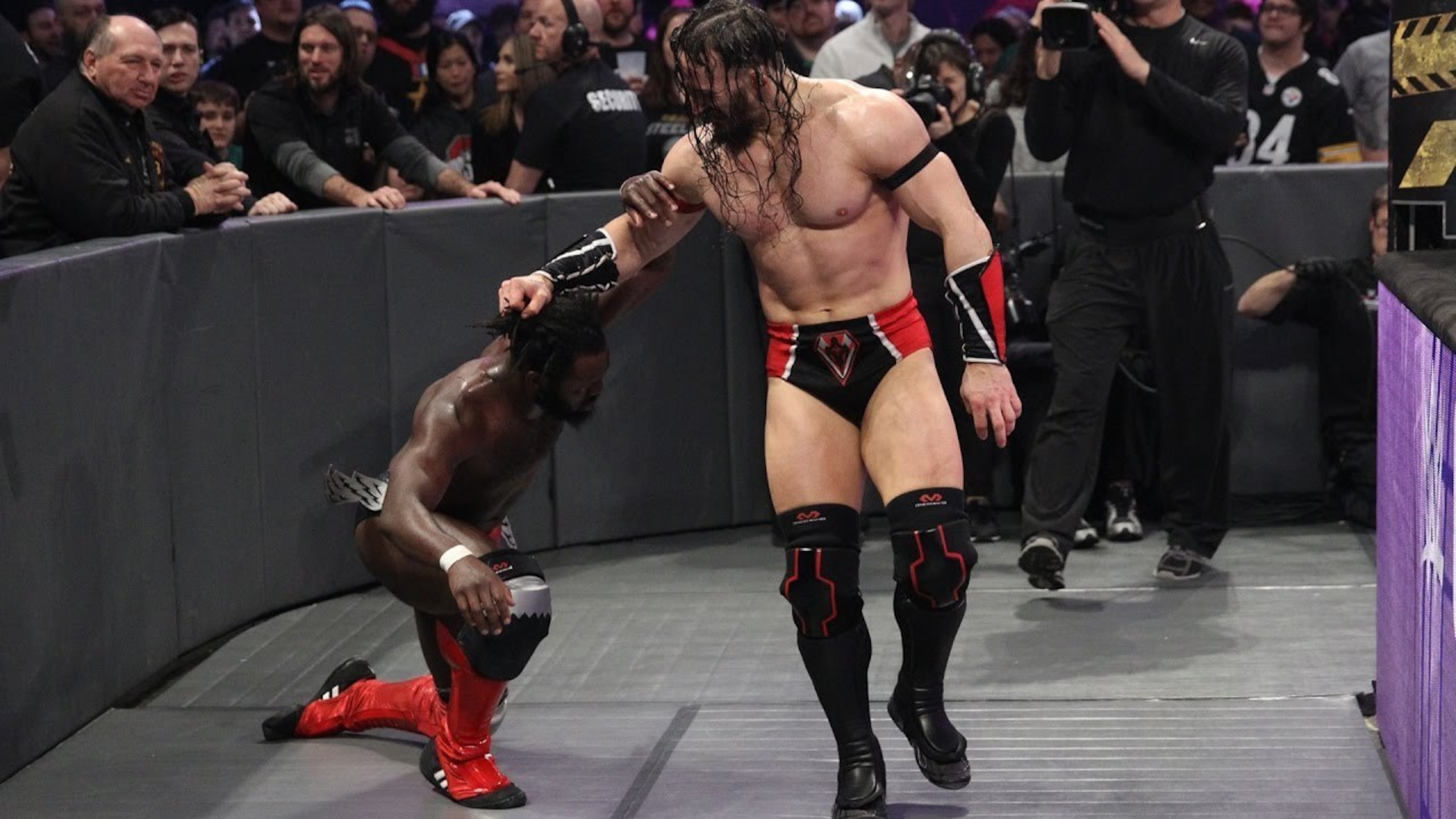 Neville beating up Rich Swann at Roadblock.