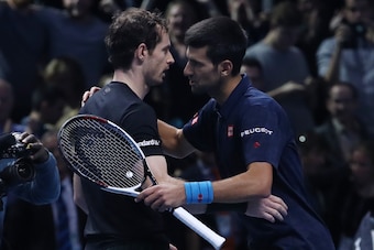 Andy Murray and Novak Djokovic hug after the 2016 ATP World Tour Finals in London.