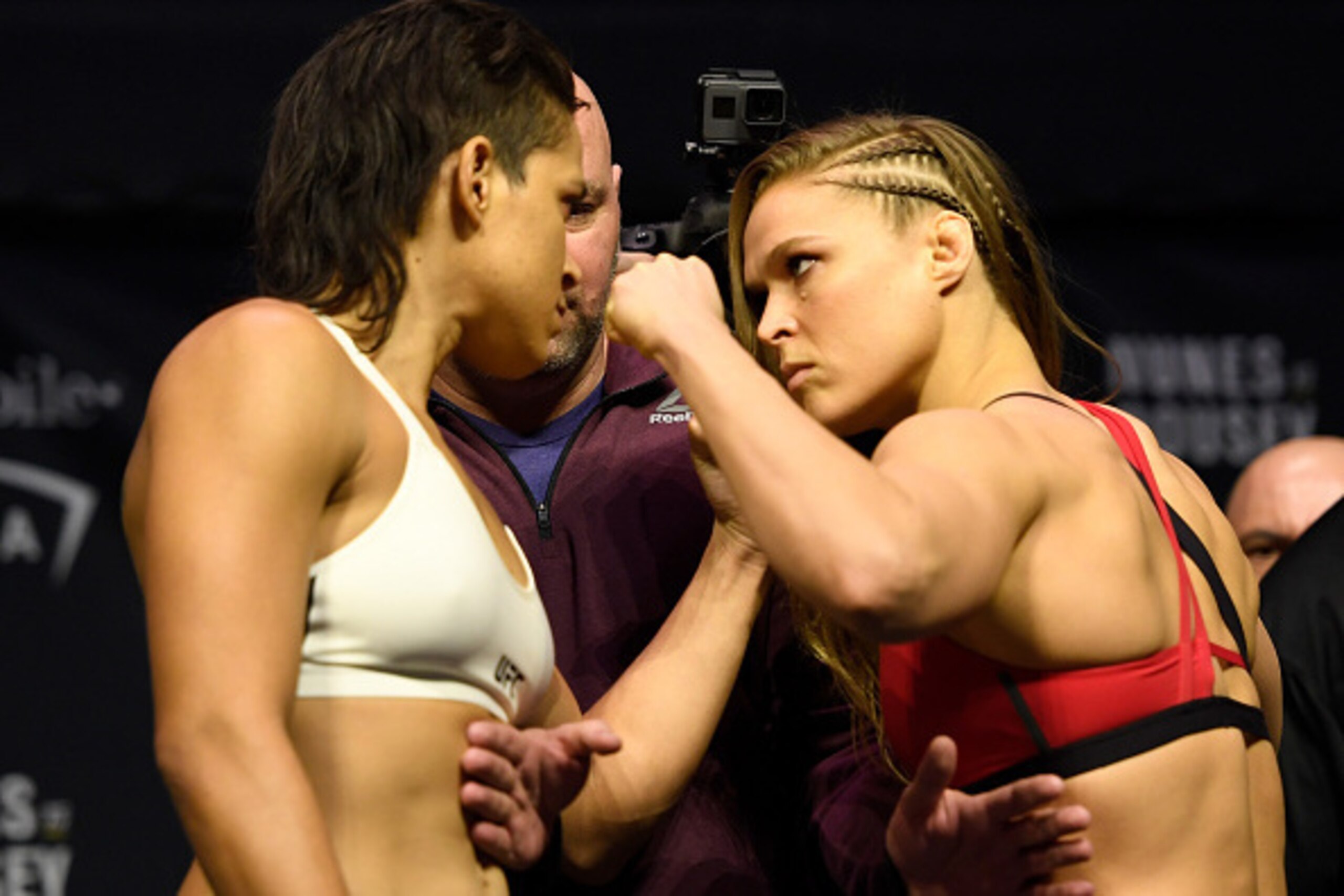 Amanda Nunes (left) and Ronda Rousey