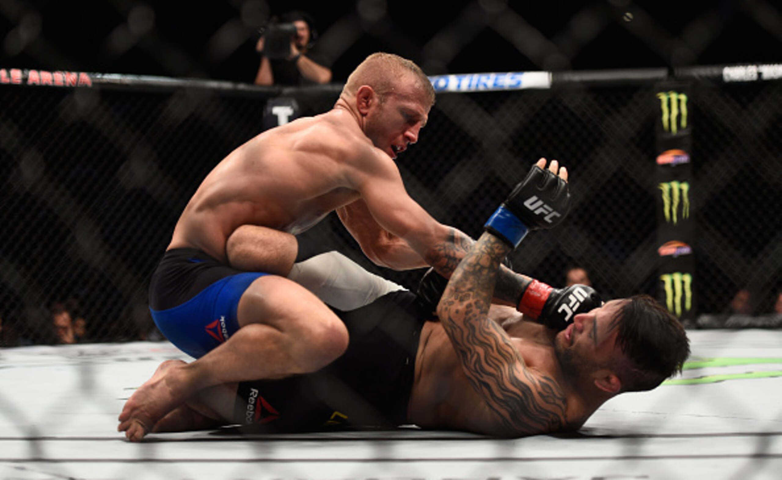 TJ Dillashaw (top) fights John Lineker
