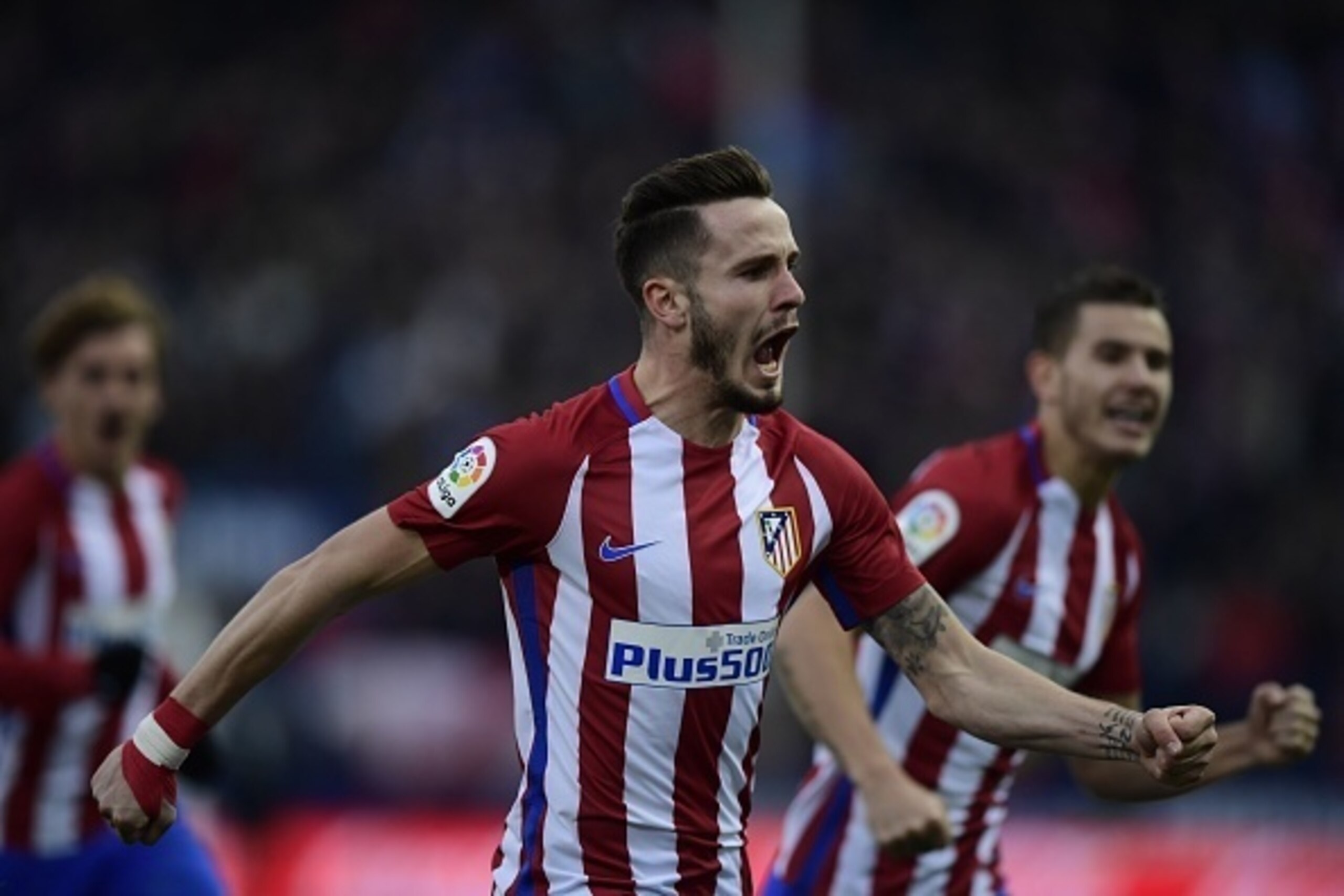 Saul Niguez celebrates for Athletico Madrid.