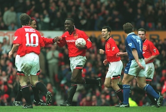 Andy Cole celebrates one of five goals against Ipswich Town in 1995.