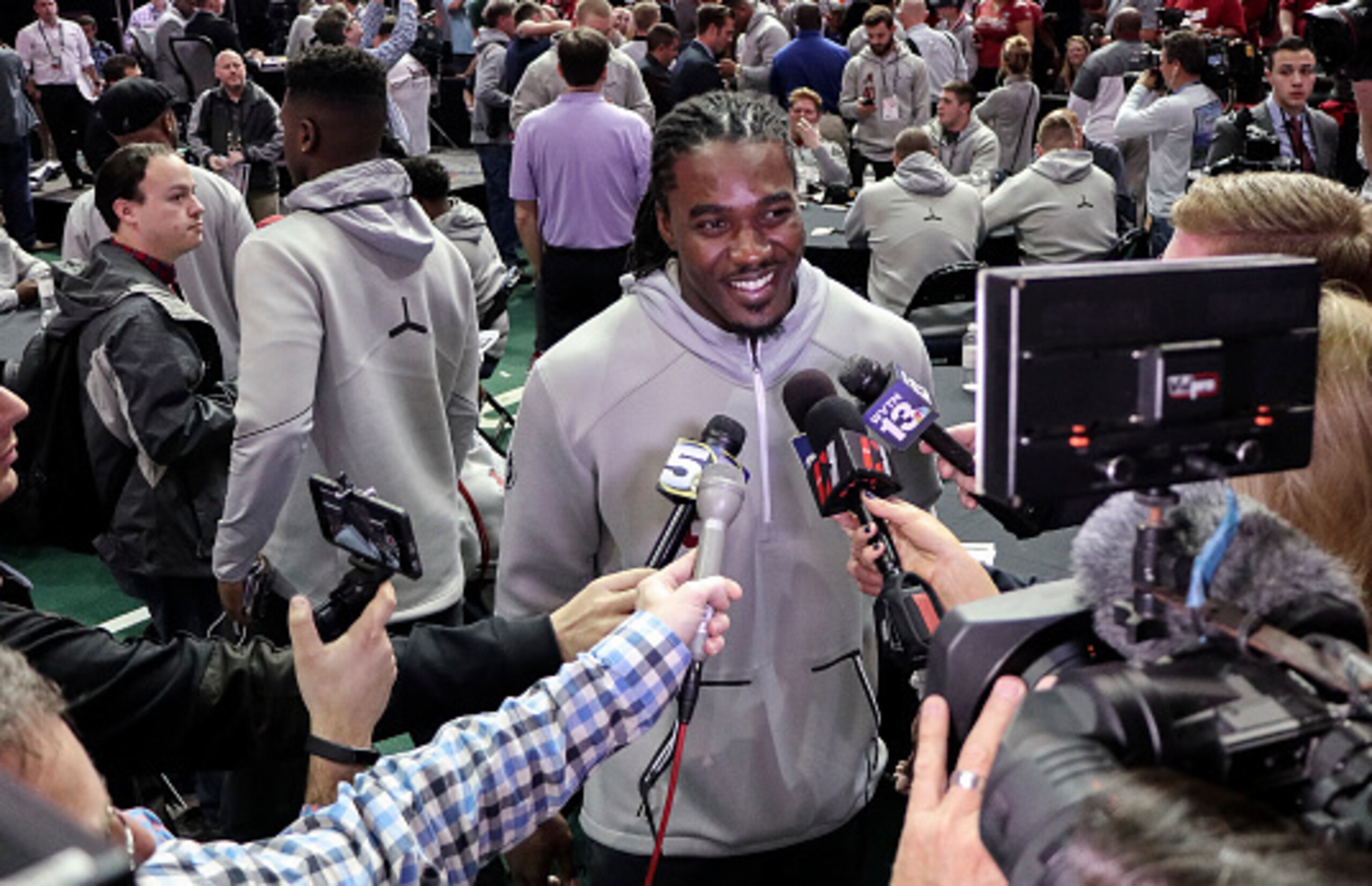 Running back Bo Scarbrough told reporters at Saturday's media day that he'll definitely be back at Alabama next season.
