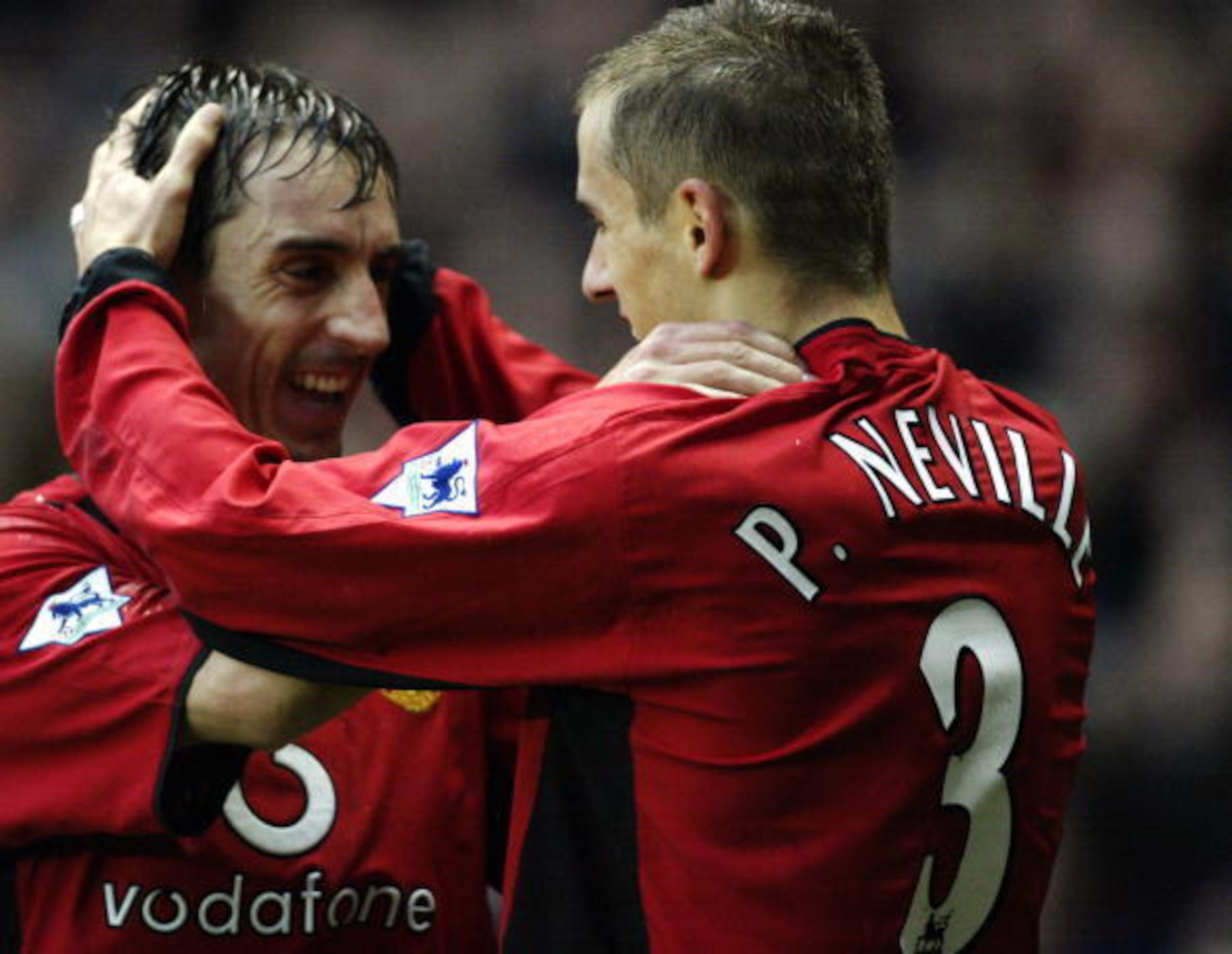 Gary and Phil Neville in their United days.
