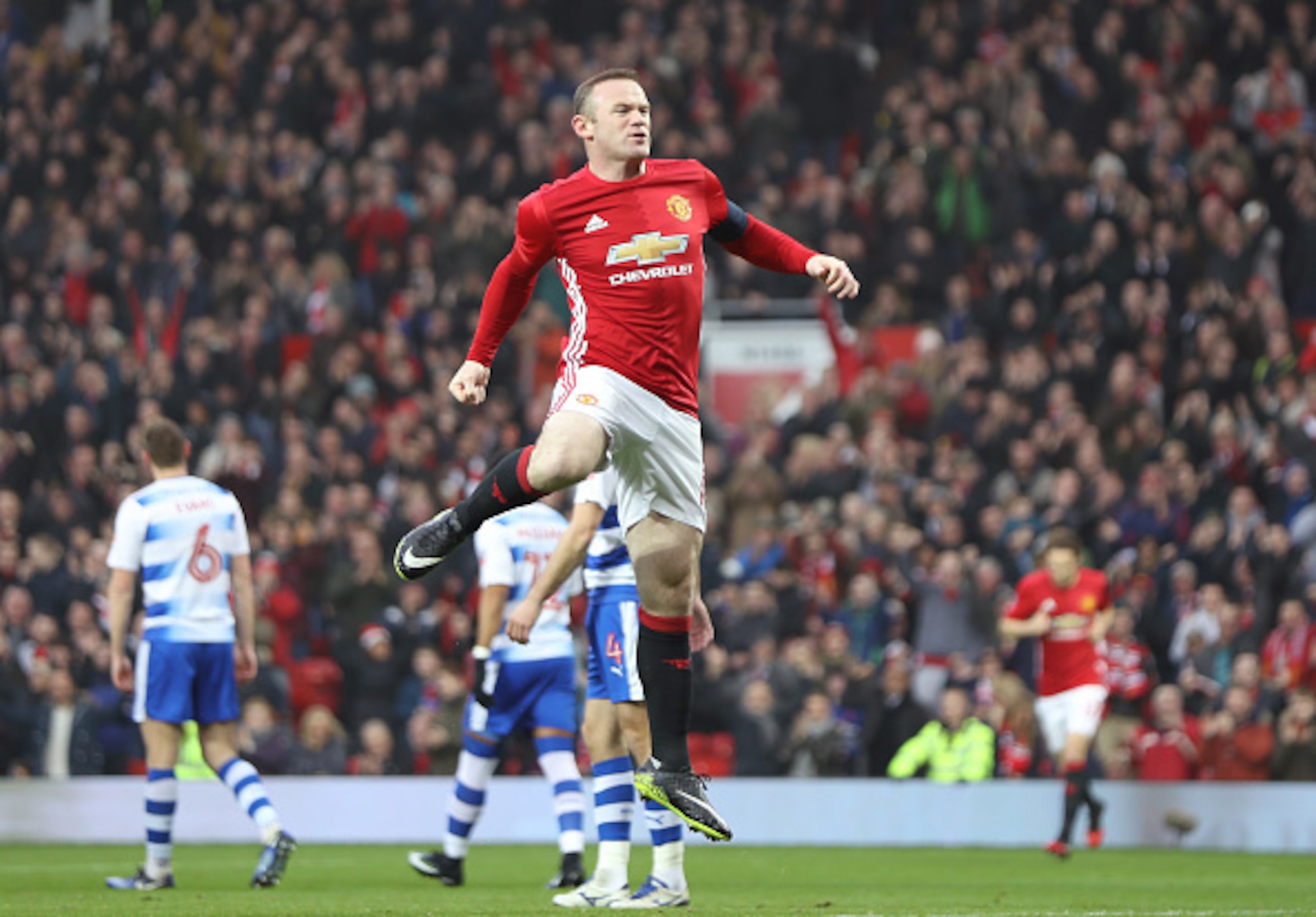 Wayne Rooney celebrates as he equals Sir Bobby Charlton's record goal tally for United.