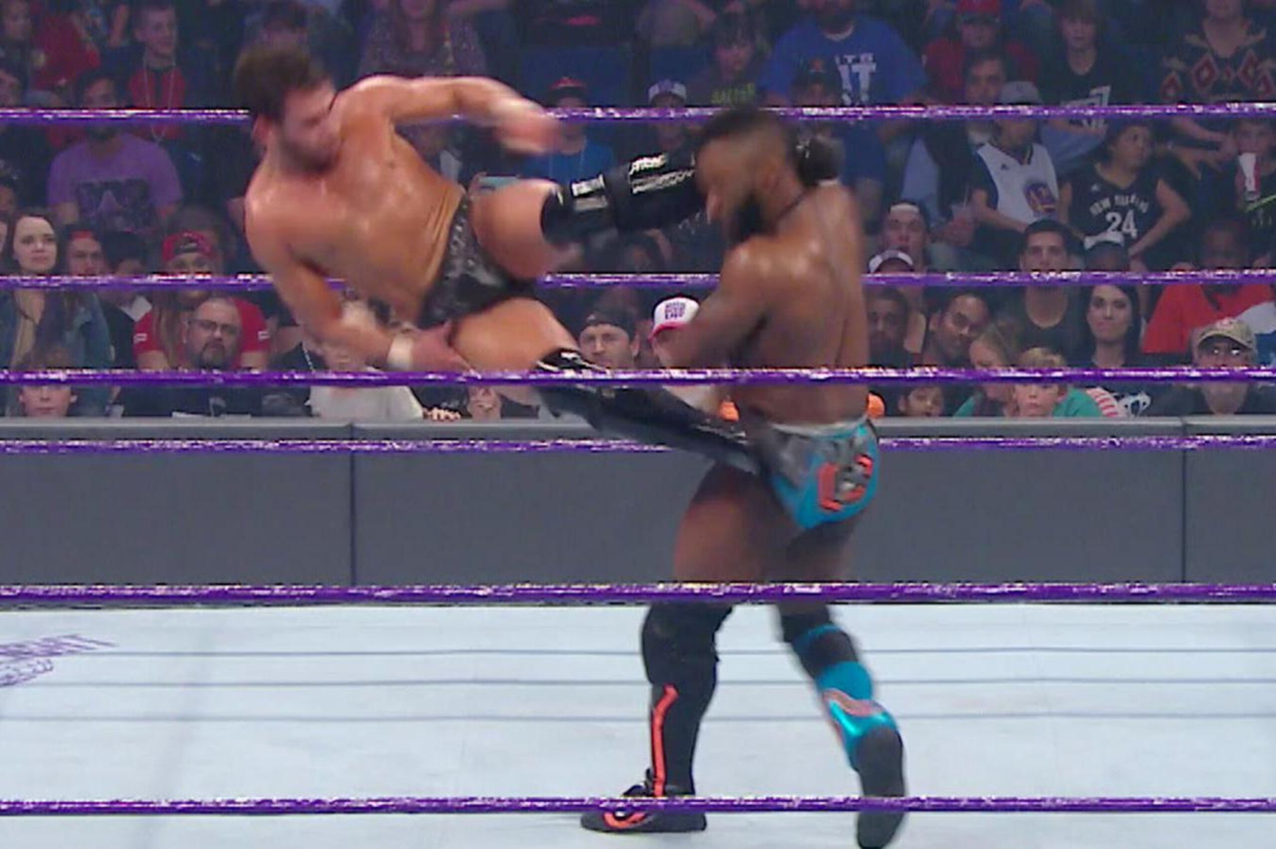 Noam Dar kicking Cedric Alexander's head off.