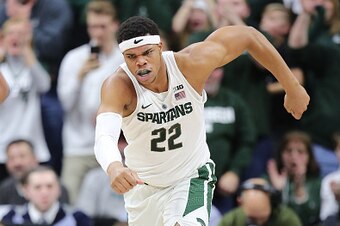 EAST LANSING, MI - JANUARY 4:  Miles Bridges #22 of the Michigan State Spartans celebrates his dunk in the second half against the Rutgers Scarlet Knights at the Breslin Center on January 4, 2017 in East Lansing, Michigan. (Photo by Rey Del Rio/Getty Imag