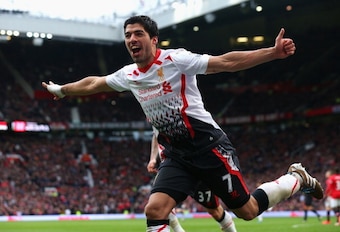 Suarez celebrates at Old Trafford.