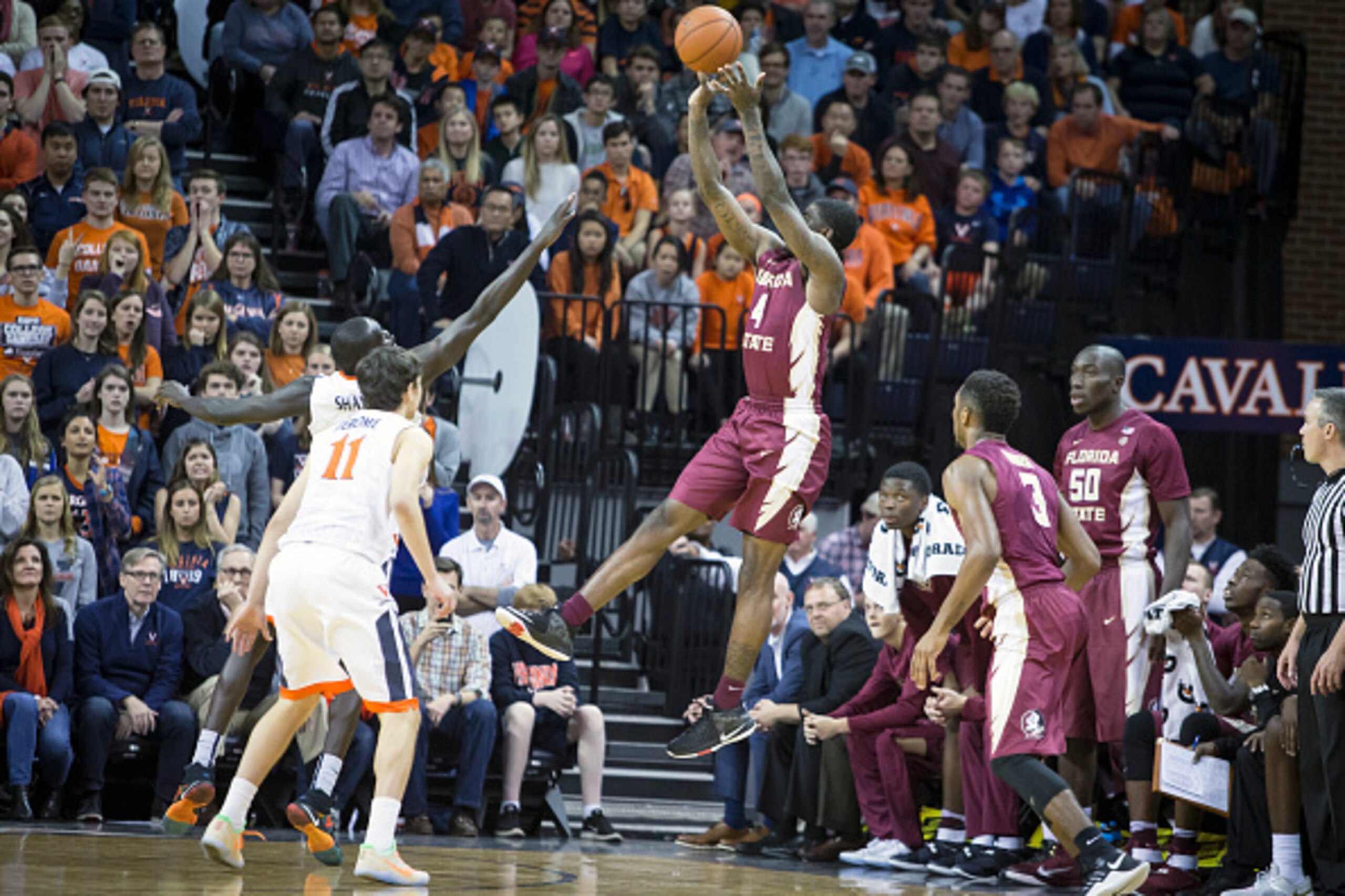 Dwayne Bacon shoots against Virginia.