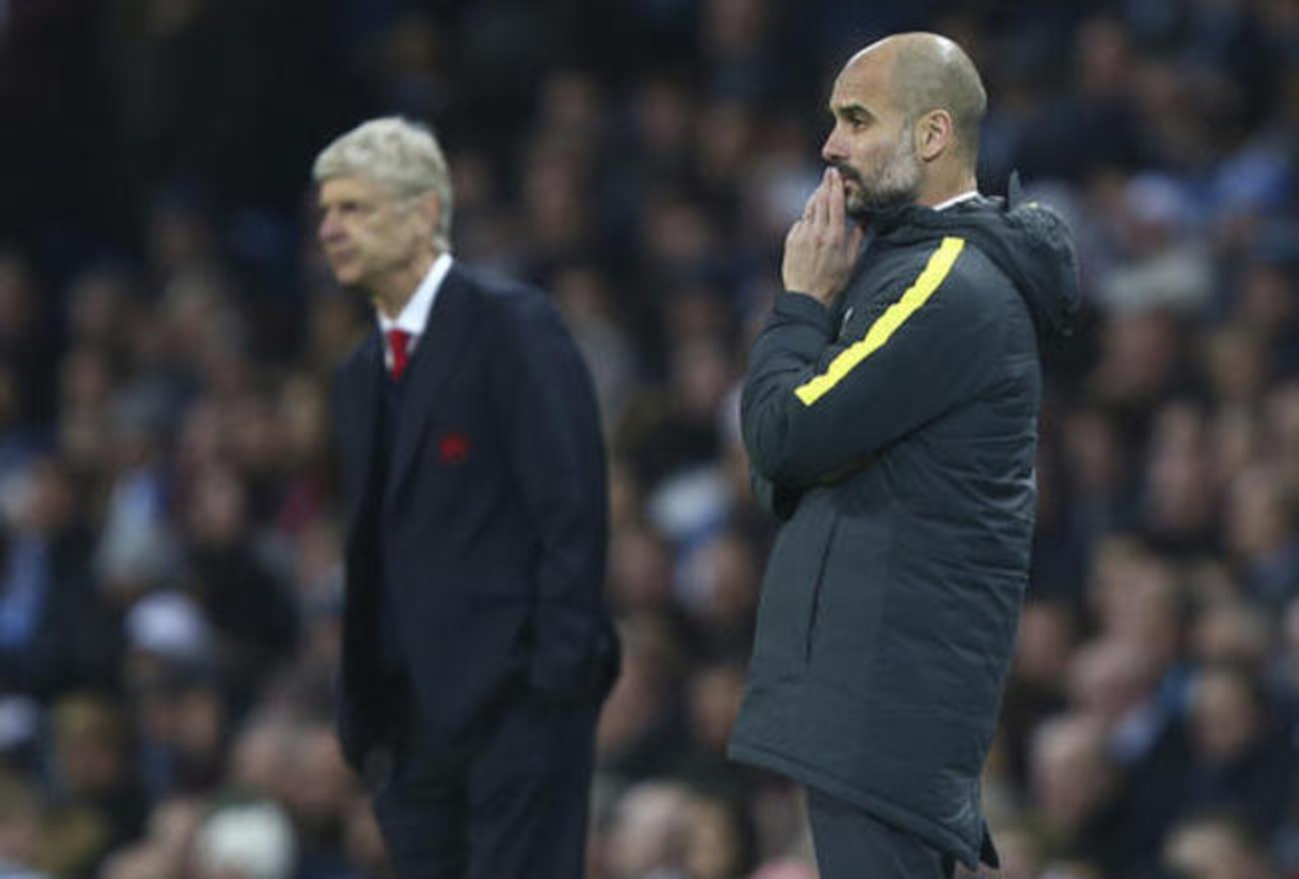 Arsene Wenger's top-four spot is under threat from Pep Guardiola and Jose Mourinho.