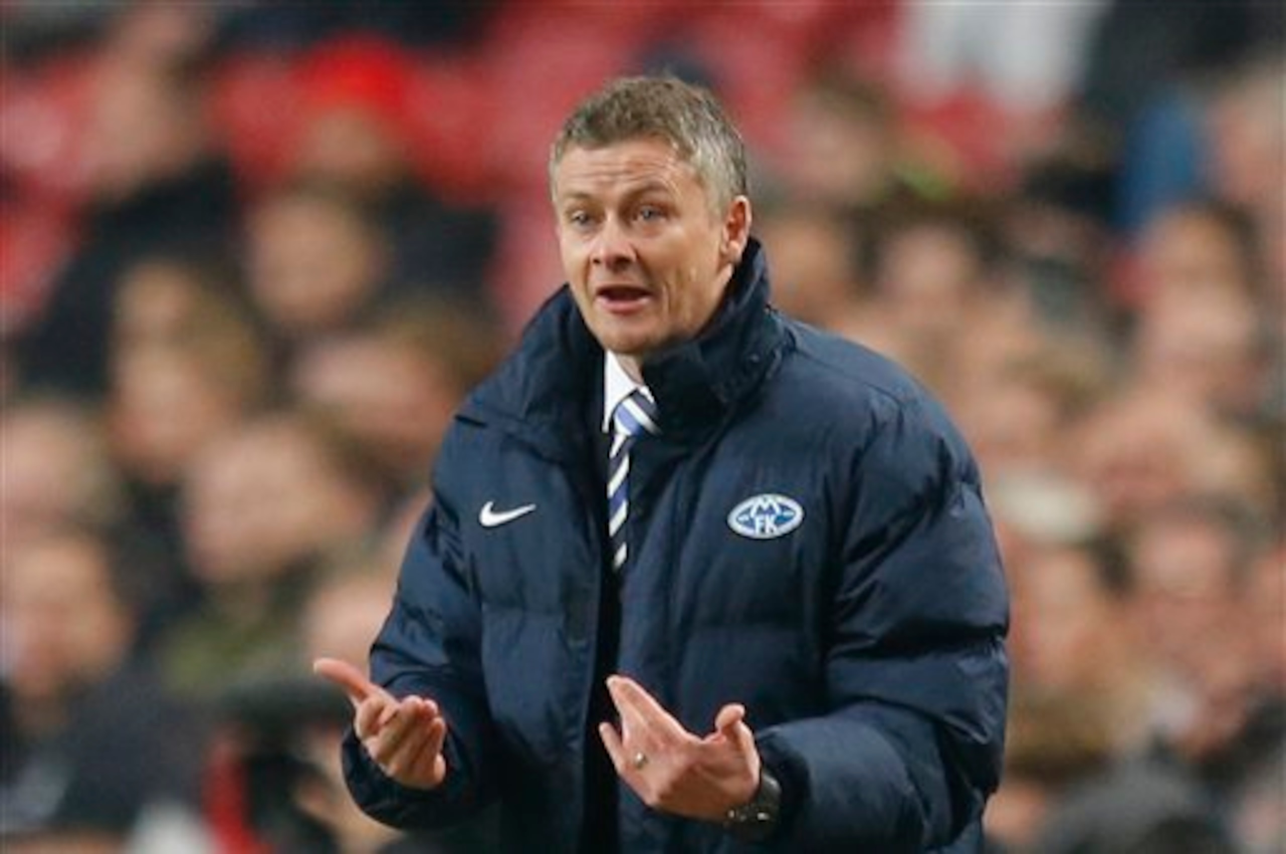 The Baby-Faced Tactician: Solskjaer on the Molde touchline.
