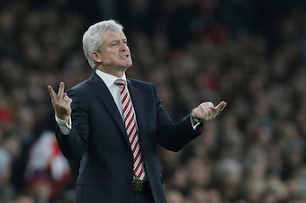 Hughes on Stoke's touchline.