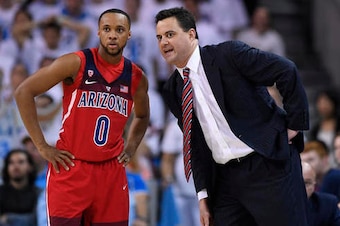 Arizona head coach Sean Miller (right)