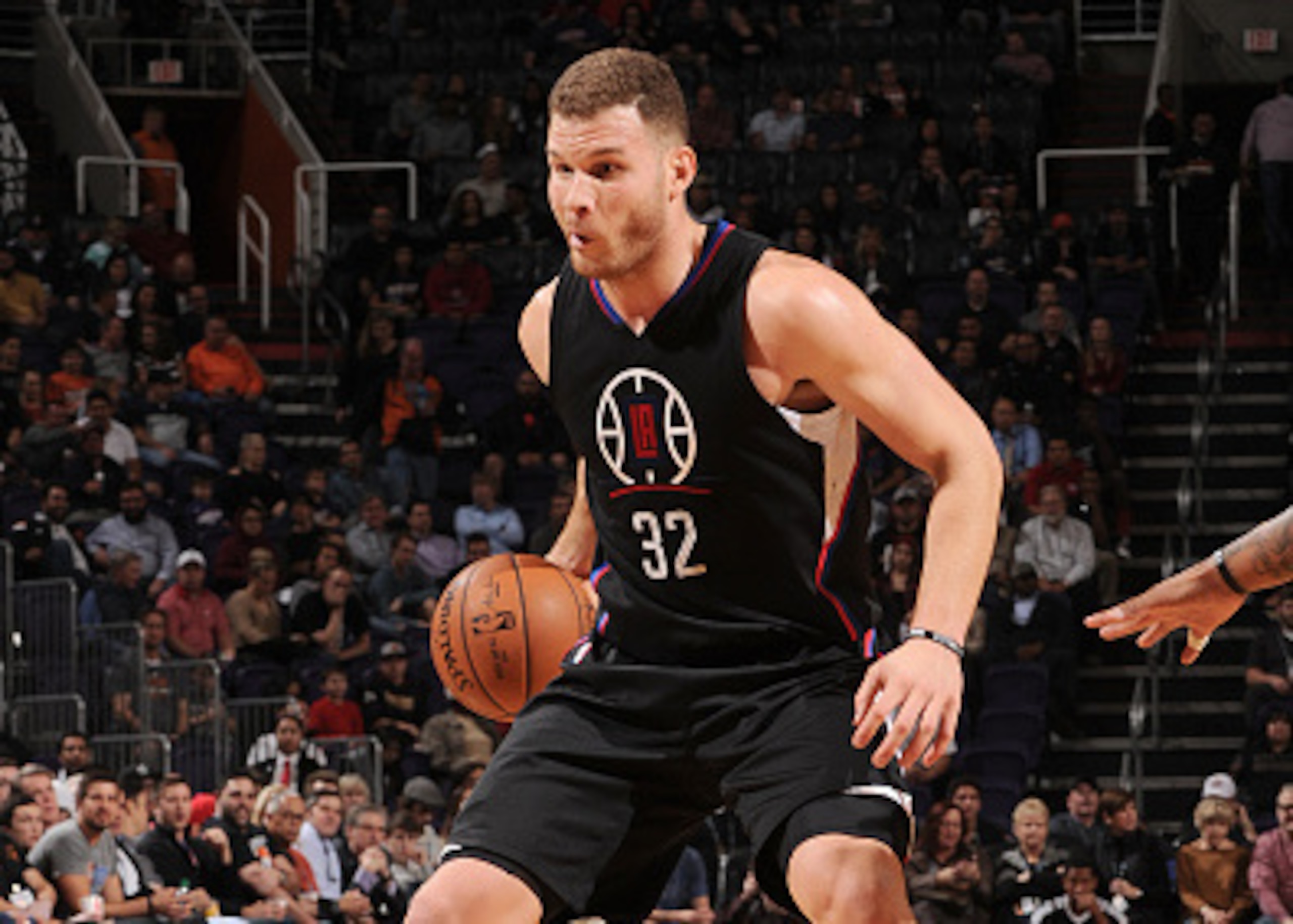 Clippers PF Blake Griffin is about to throw this through his legs...backward. Clippers PF Blake Griffin is about to throw this through his legs...backward.