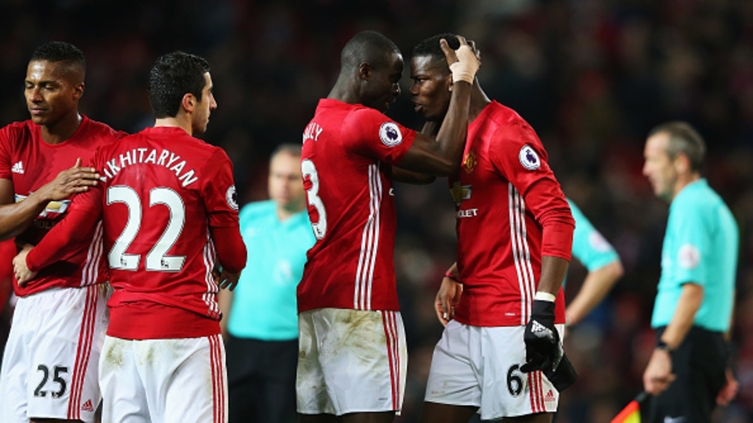 Eric Bailly celebrates with Pogba.