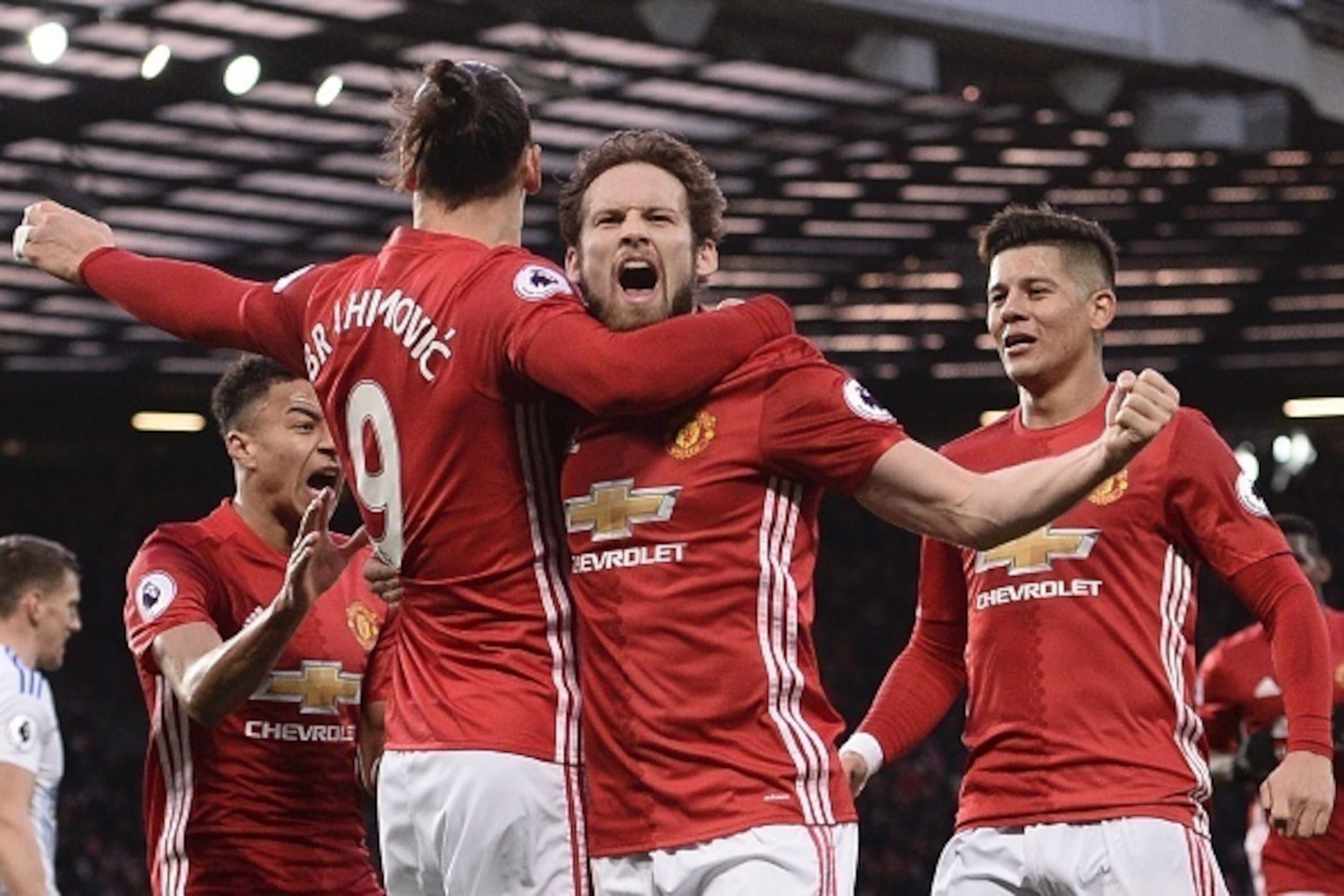 Daley Blind celebrates an Old Trafford goal.