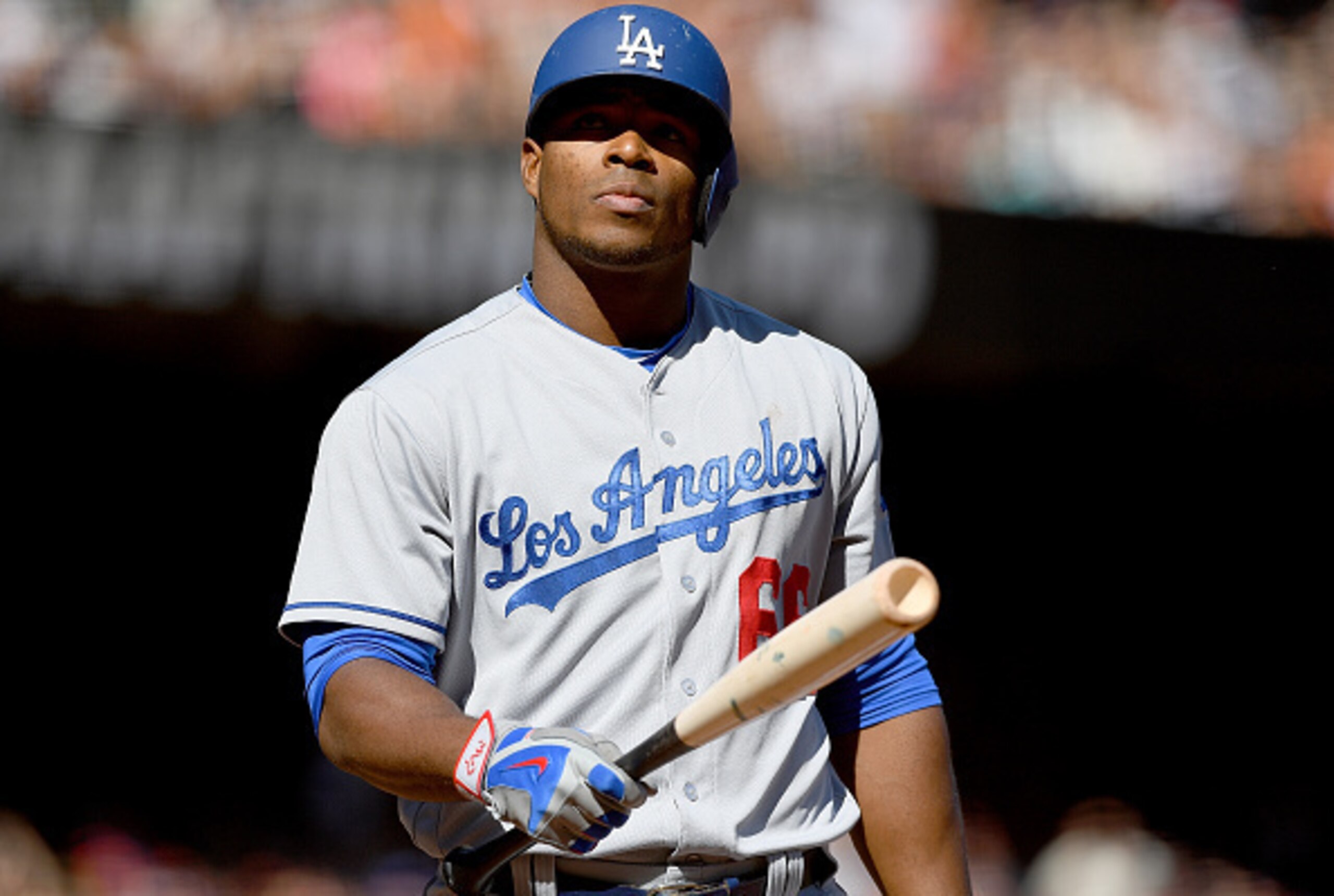 SAN FRANCISCO, CA - OCTOBER 01:  Yasiel Puig #66 of the Los Angeles Dodgers reacts after he was called out on strikes against the San Francisco Giants in the top of the seventh inning at AT&T Park on October 1, 2016 in San Francisco, California.  (Photo b