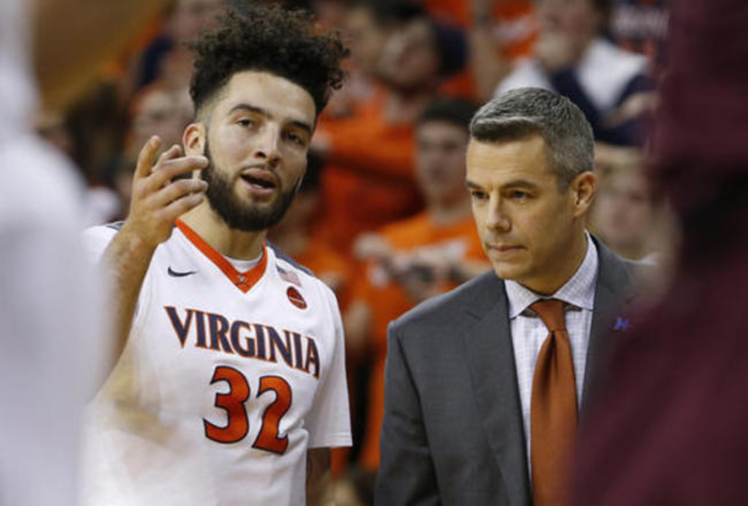 Guard London Perrantes (left) and head coach Tony Bennett